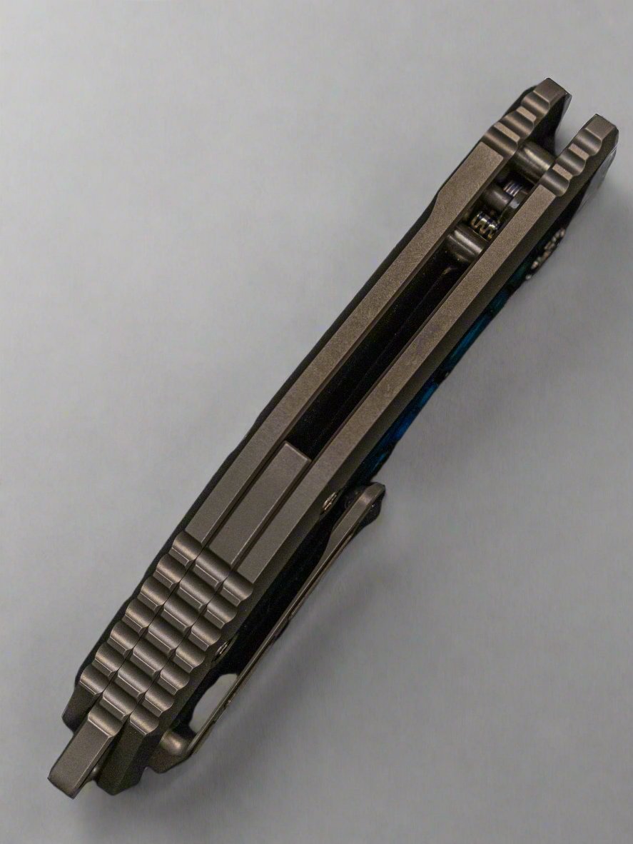 Pre Owned Heretic Medusa (SN 005) Blue Vegas Forge Damascus Titanium w/ Mammoth Ivory Inlays Mammoth Ivory Inlaid Button