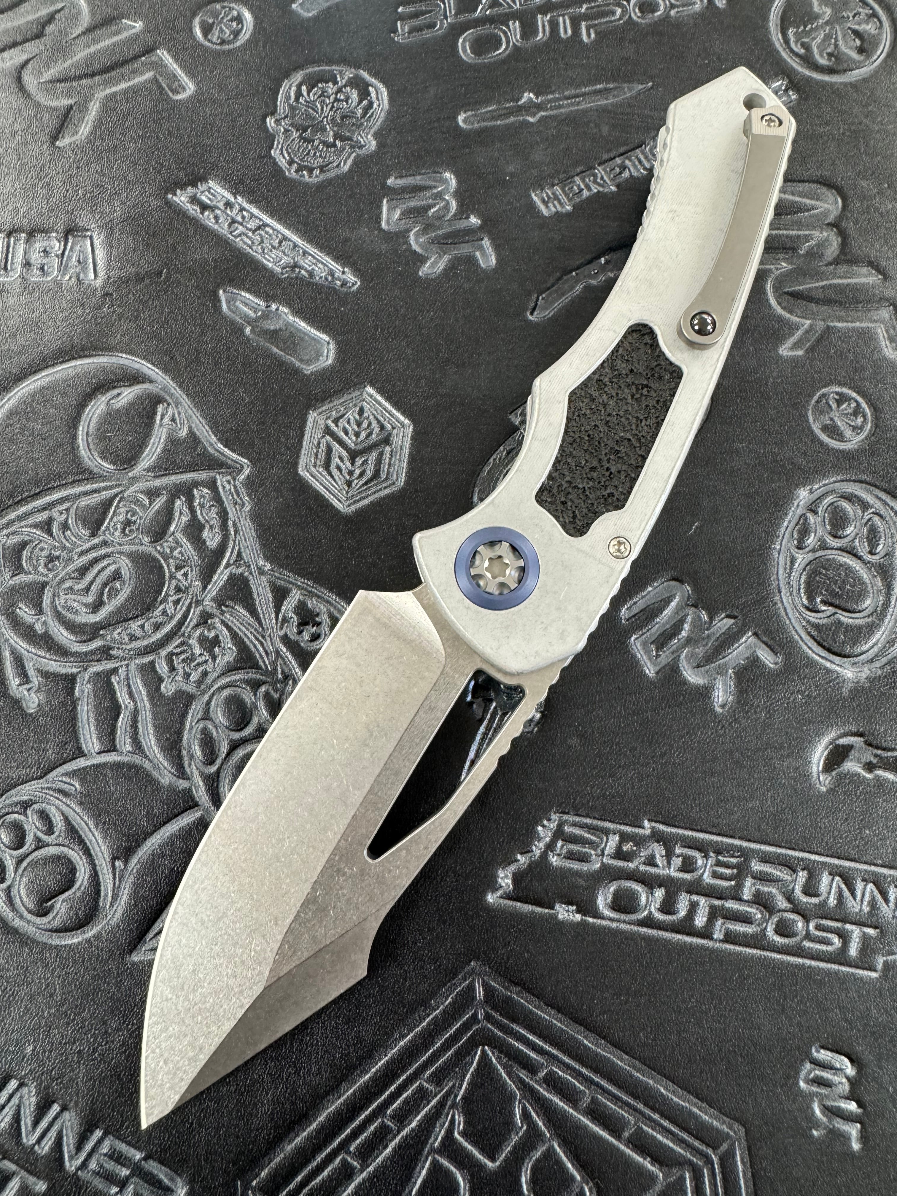 Heretic Knives Pariah Manual Button Lock Blizzard Worn Aluminum Handles w/ Stonewash MagnaCut H046-2A-BLZ