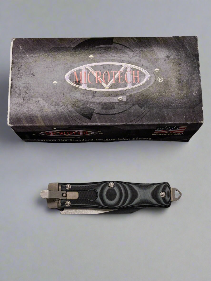 Pre Owned MICROTECH GREEN OSS COBRA KNIFE, AUTO LEVER LOCK, BLACK TWO TONE PART SER BLADE, 137-2GR