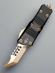Pre Owned Like New MICROTECH MINI TROODON OTF KNIFE- HELLHOUND EDGE- BLACK HANDLE-BRONZE FINISHED BLADE 819-13 S