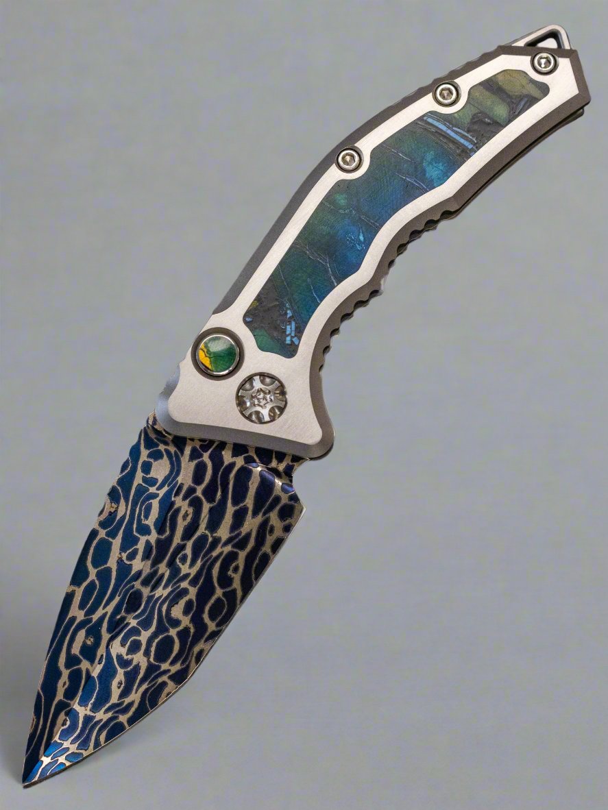 Pre Owned Heretic Medusa (SN 005) Blue Vegas Forge Damascus Titanium w/ Mammoth Ivory Inlays Mammoth Ivory Inlaid Button