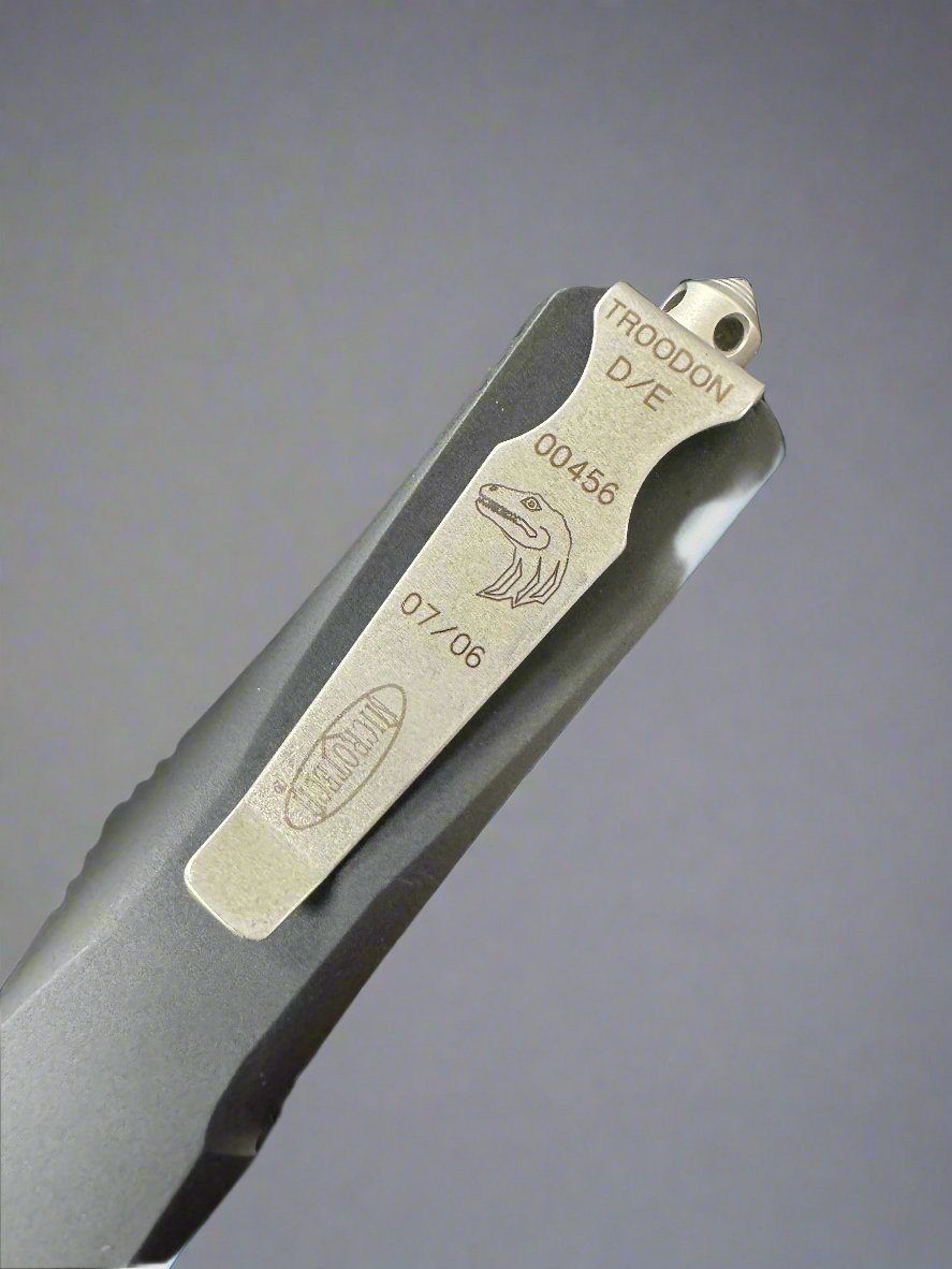 Pre Owned Microtech Vintage Troodon D/E Titankote Plain VGC in Box