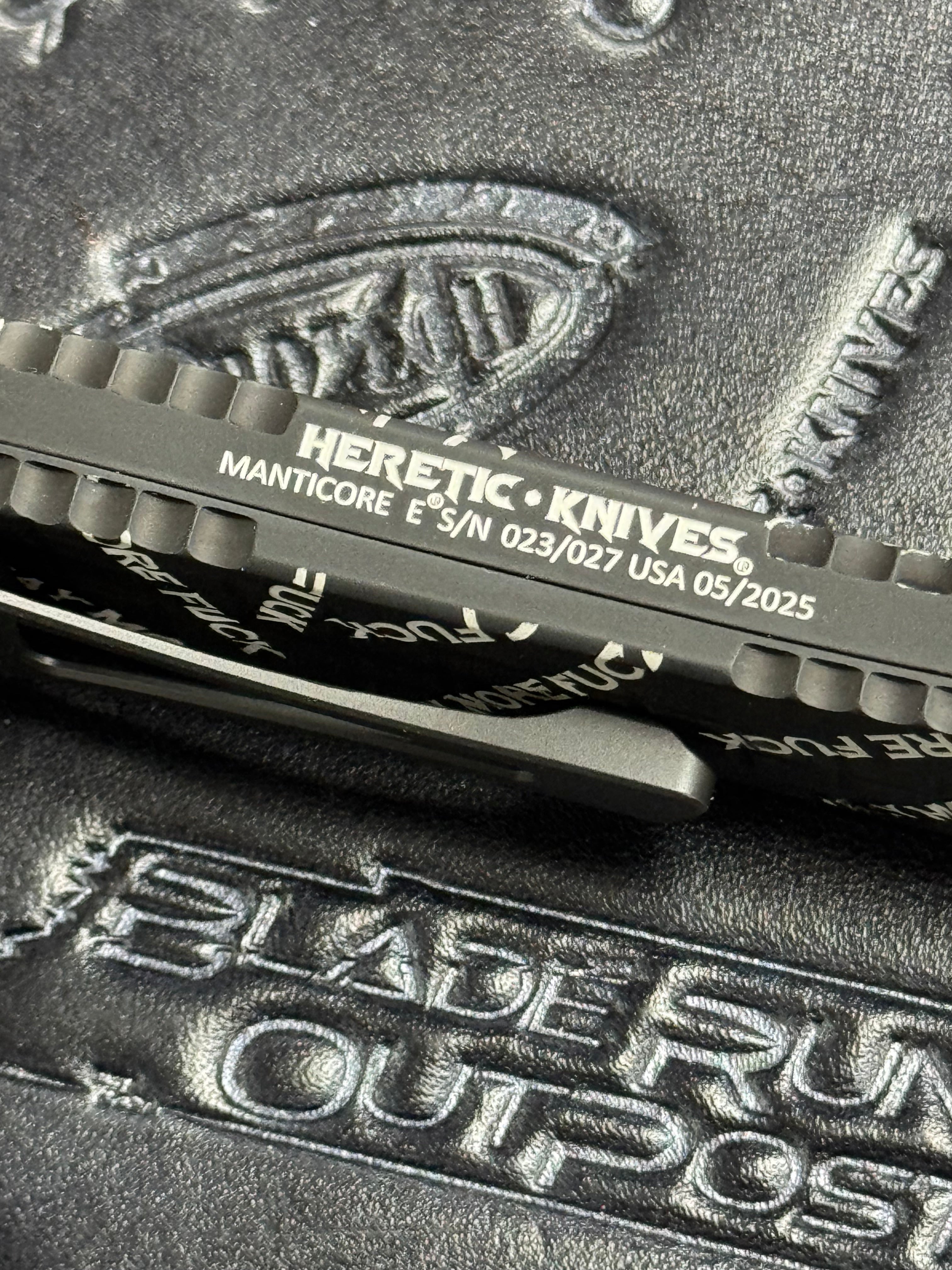 Heretic Manticore E - Snugglez Says “Say More Fuck” - Recurve Magnacut & Aluminum Frag Black Cerakote - H029F-10A-FU