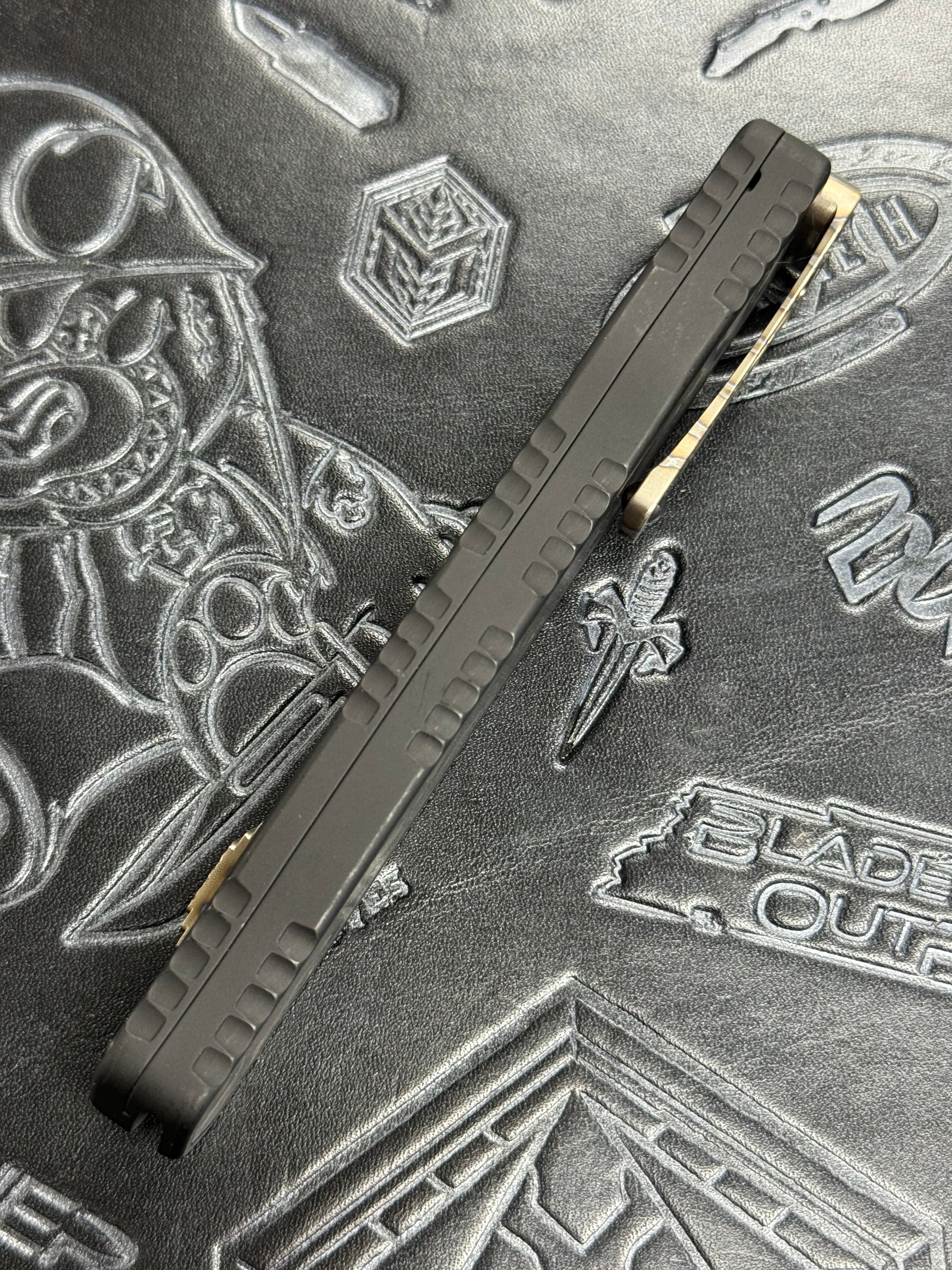 Pre Owned Heretic Knives Custom Cleric II - Tanto - Hand Ground Vegas Forge Polished Damascus, Black Ano handle w/ Marbled CF Inlay, Flamed Ti Button & Clip