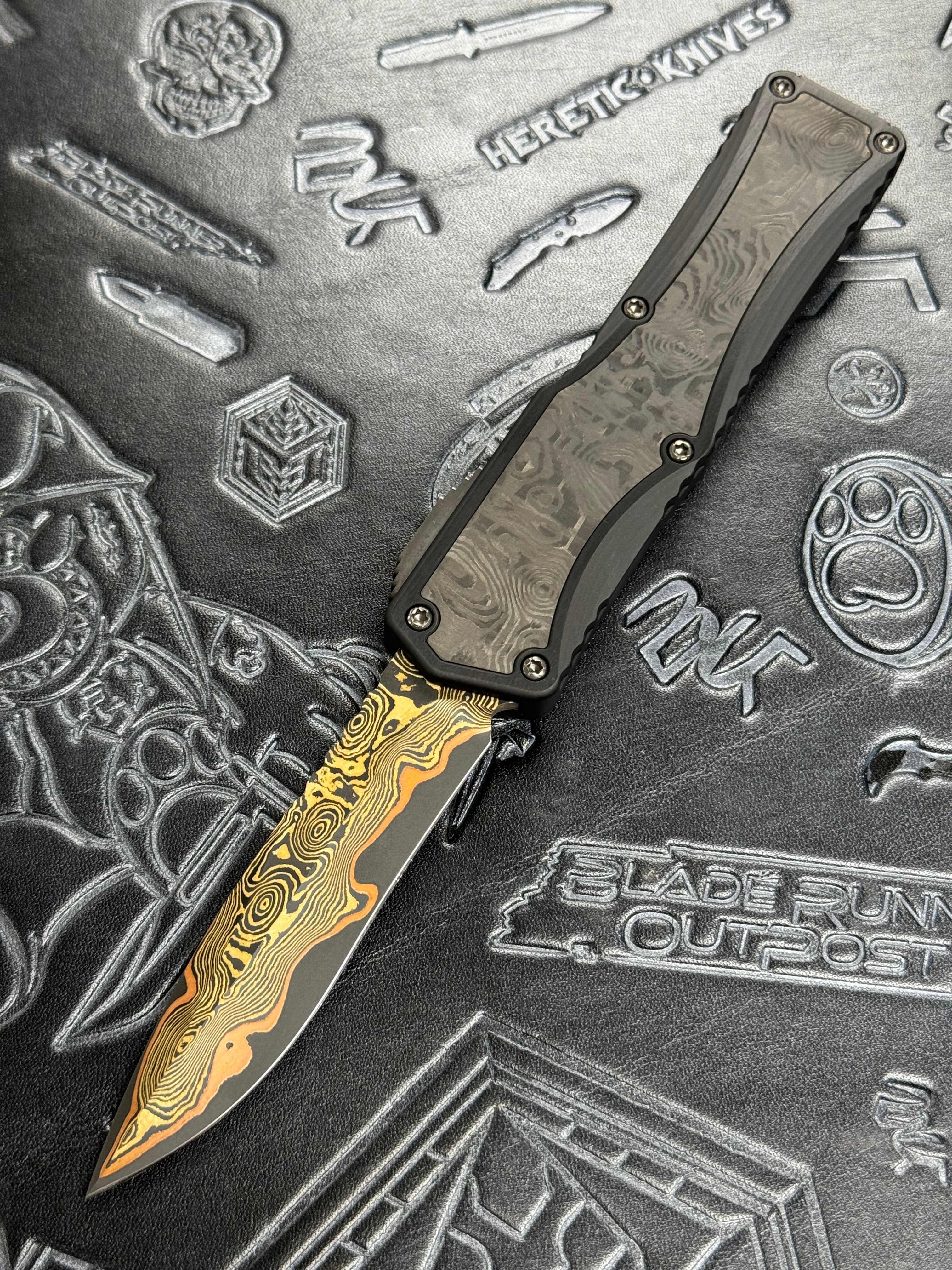 Pre Owned Heretic Knives Colossus Fat Carbon & Baker Forge Damascus Recurve