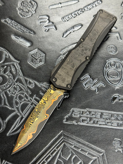 Pre Owned Heretic Knives Colossus Fat Carbon & Baker Forge Damascus Recurve