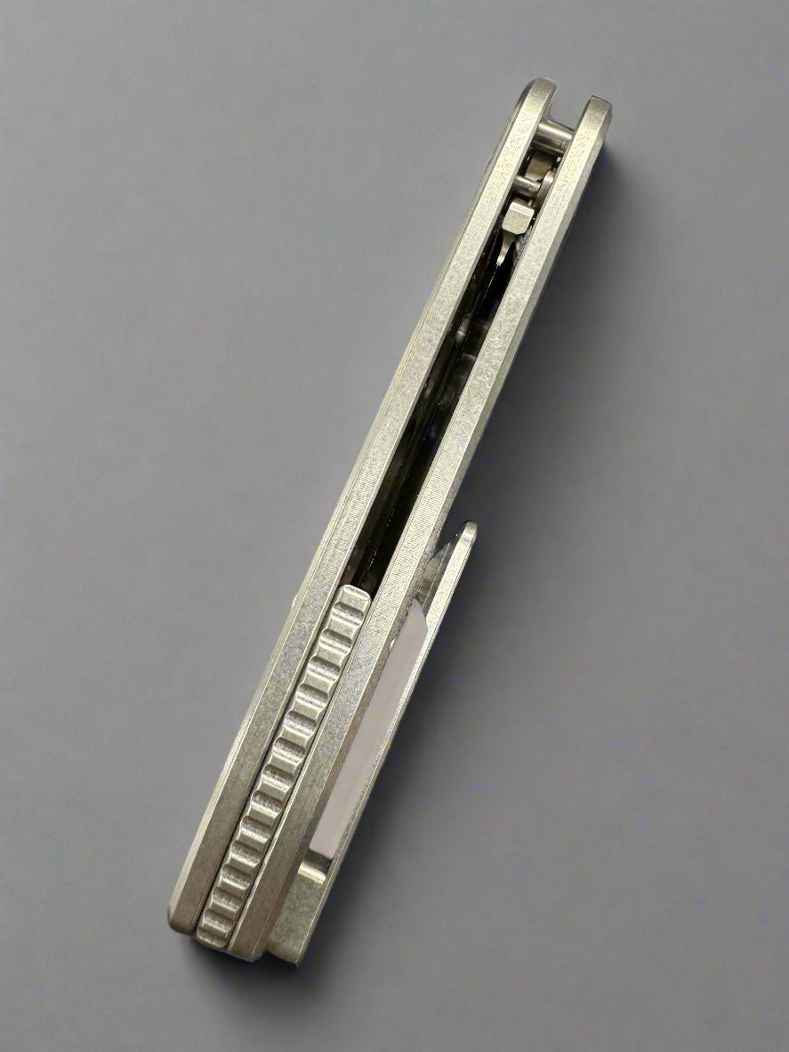 American Blade Works ABW MODEL 1 BUTTON LOCK TITANIUM Magnacut American Camo Carbon