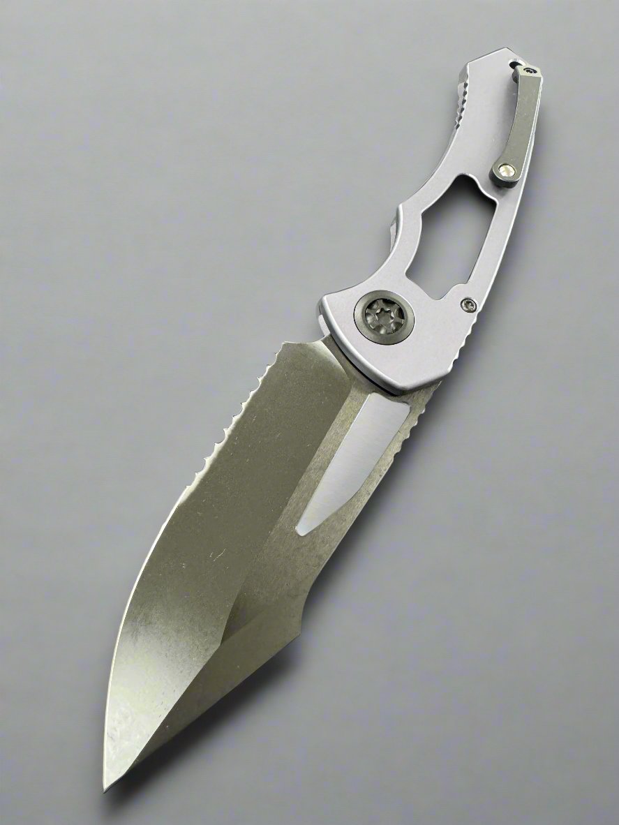 Heretic Knives Pariah M/A Button Lock Gray Aluminum Handles w/ DLC Serrated MagnaCut H046-6B-GRY