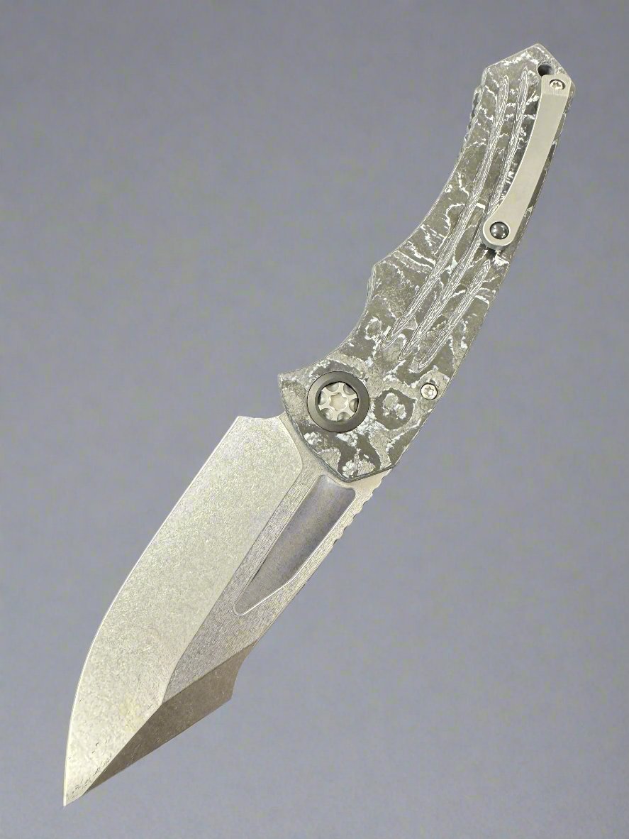 Heretic Knives Pariah M/A Button Lock White Camo Carbon Handles w/ Stonewash MagnaCut