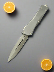 Pre Owned Microtech Vintage Troodon D/E Titankote Plain VGC in Box