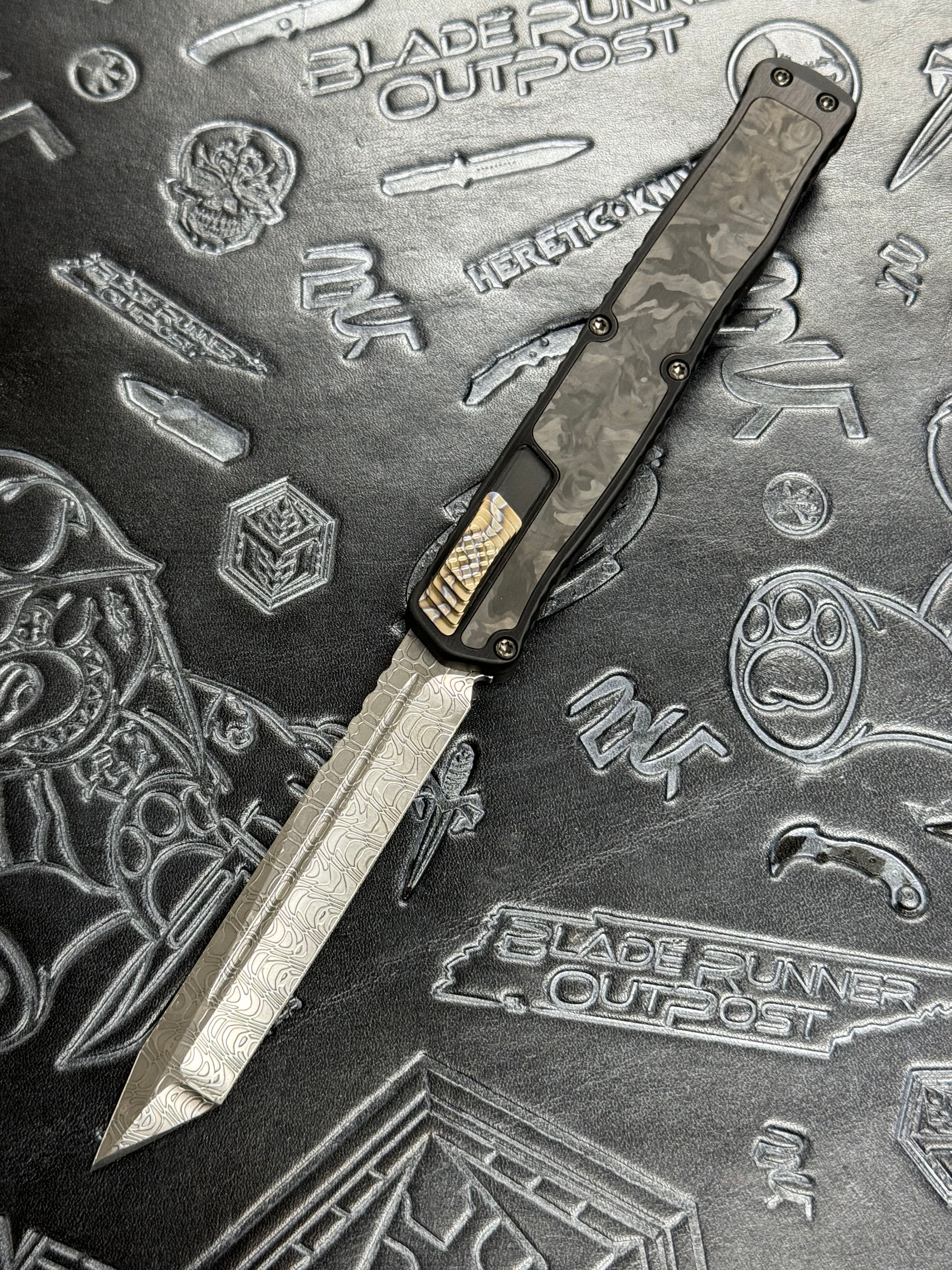 Pre Owned Heretic Knives Custom Cleric II - Tanto - Hand Ground Vegas Forge Polished Damascus, Black Ano handle w/ Marbled CF Inlay, Flamed Ti Button & Clip