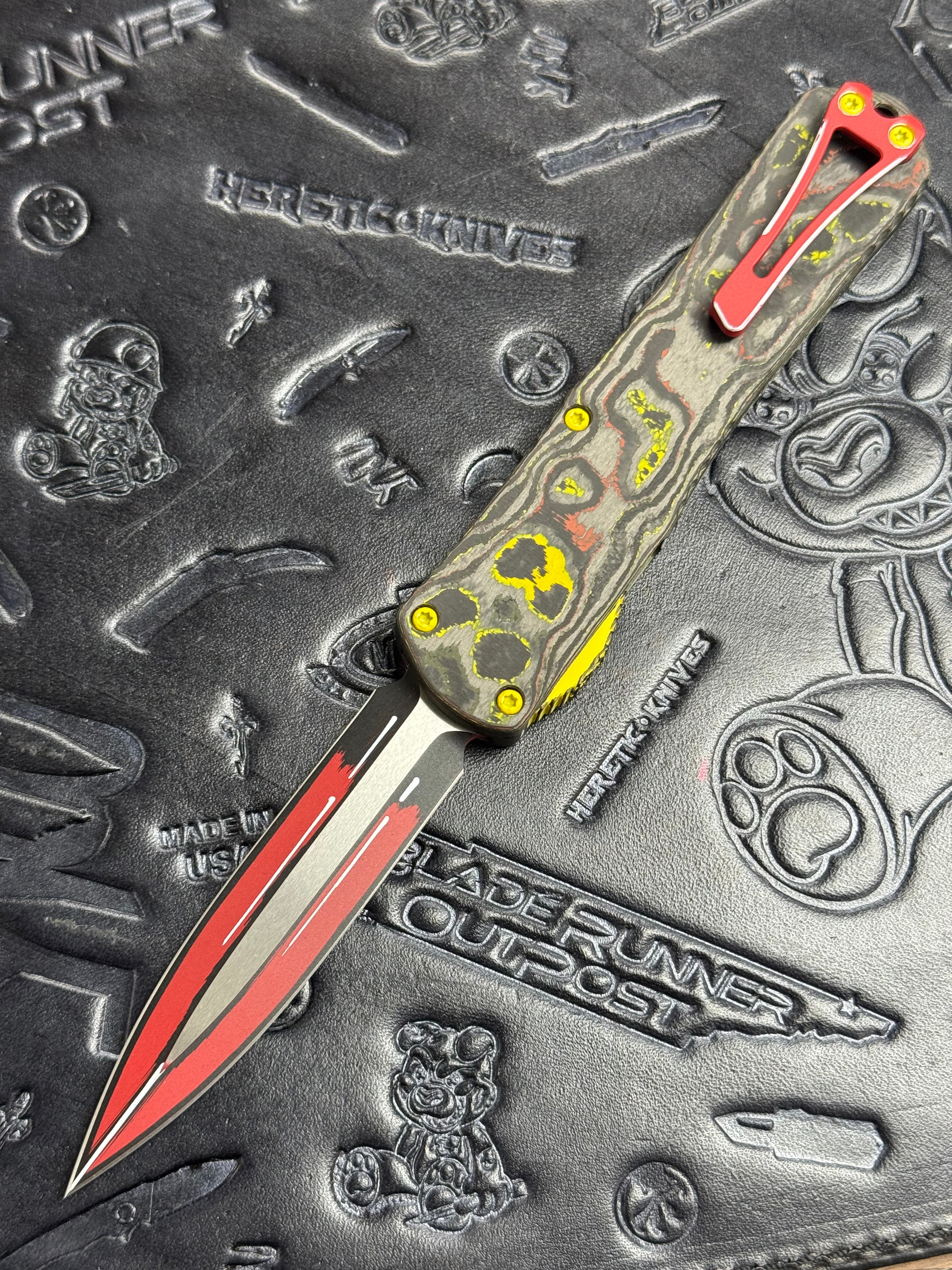 Heretic Manticore X - Bounty Hunter Cel Shade Red Double Edge - CamoCarbon Back - H032-CSR-BOUNTY