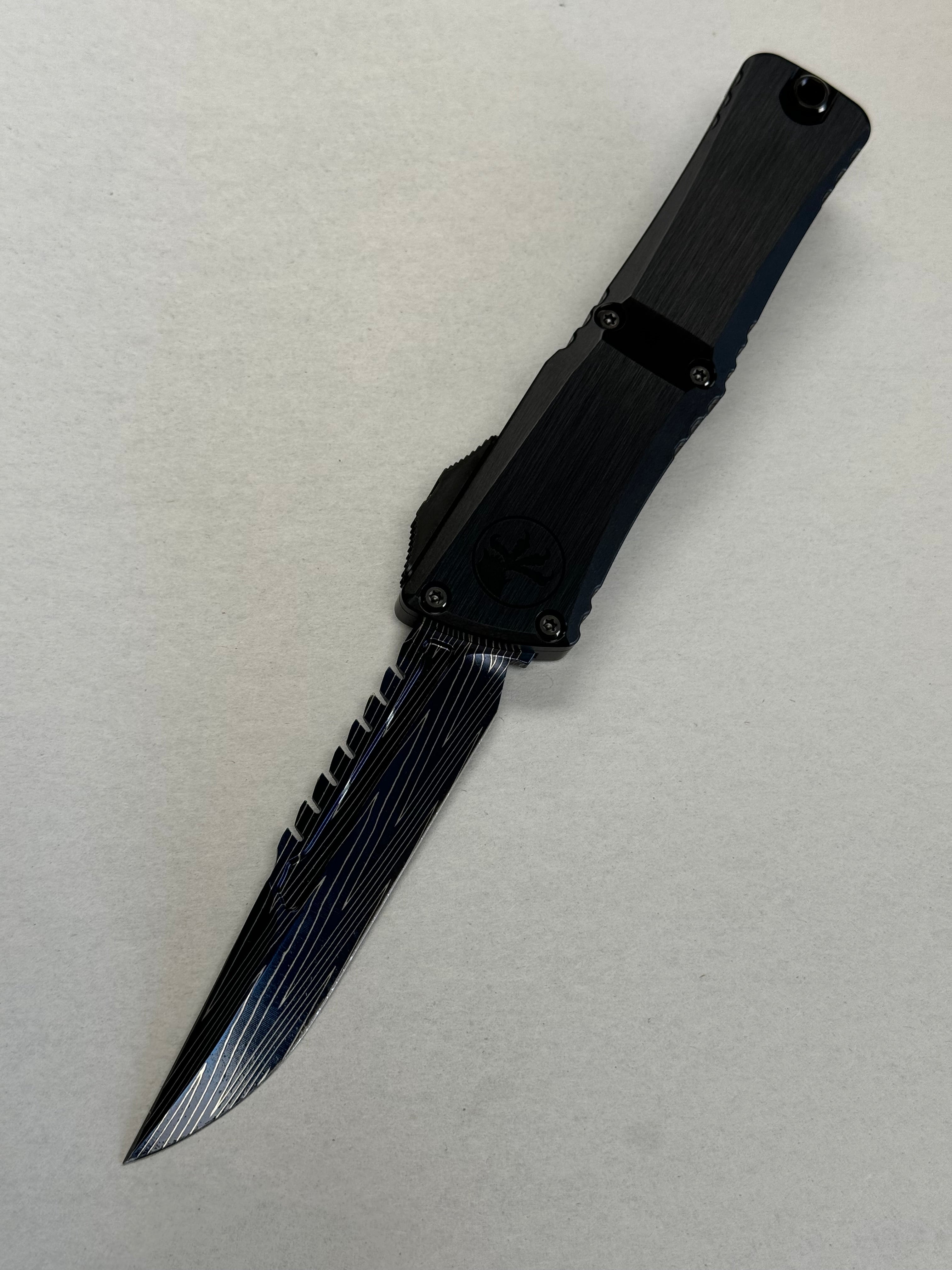 Microtech Knives Combat Troodon Gen III LT Interceptor Vegas Forge Blued Damascus & Black Hefted Handle w/ Two Tone DLC Hardware Signature Series 1217-16 MS3