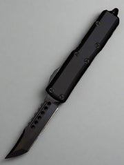 MICROTECH 719-1DLCTSH UTX-85 HELLHOUND SHADOW OTF AUTO SIGNATURE SERIES ENGRAVED DLC STANDARD BLADE WITH BLACK ALUMINUM HANDLES/ DLC HARDWARE