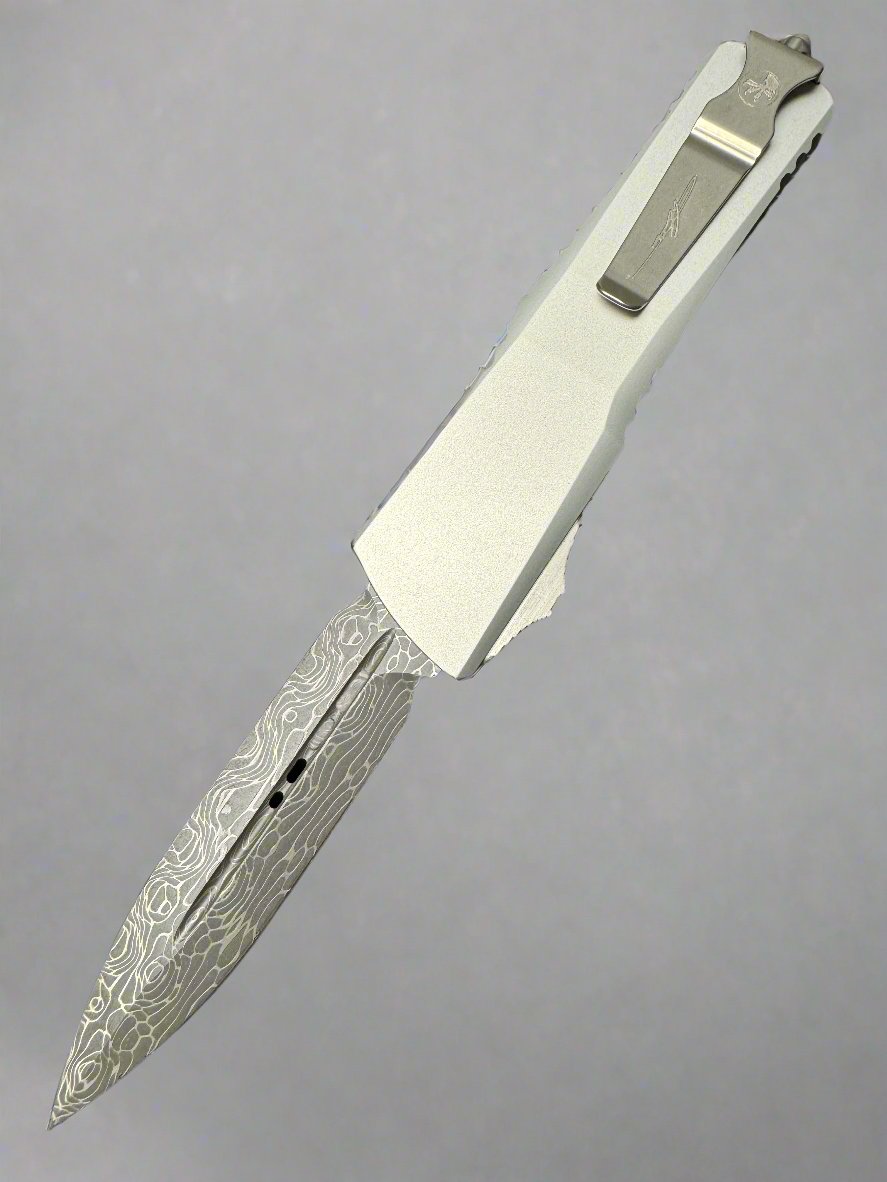 MICROTECH COMBAT TROODON OTF KNIFE- SIGNATURE SERIES- DOUBLE EDGE- CLEAR ANODIZED SMOOTH BODY HANDLE- DAMASCUS BLADE 142S-16 LPCRS
