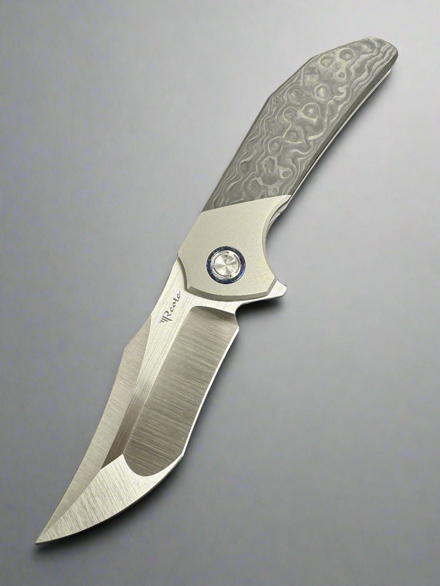 Reate Tiger - M390 Satin Blade - Black Camo Fat Carbon Handle - Zircuti Pivot Collar