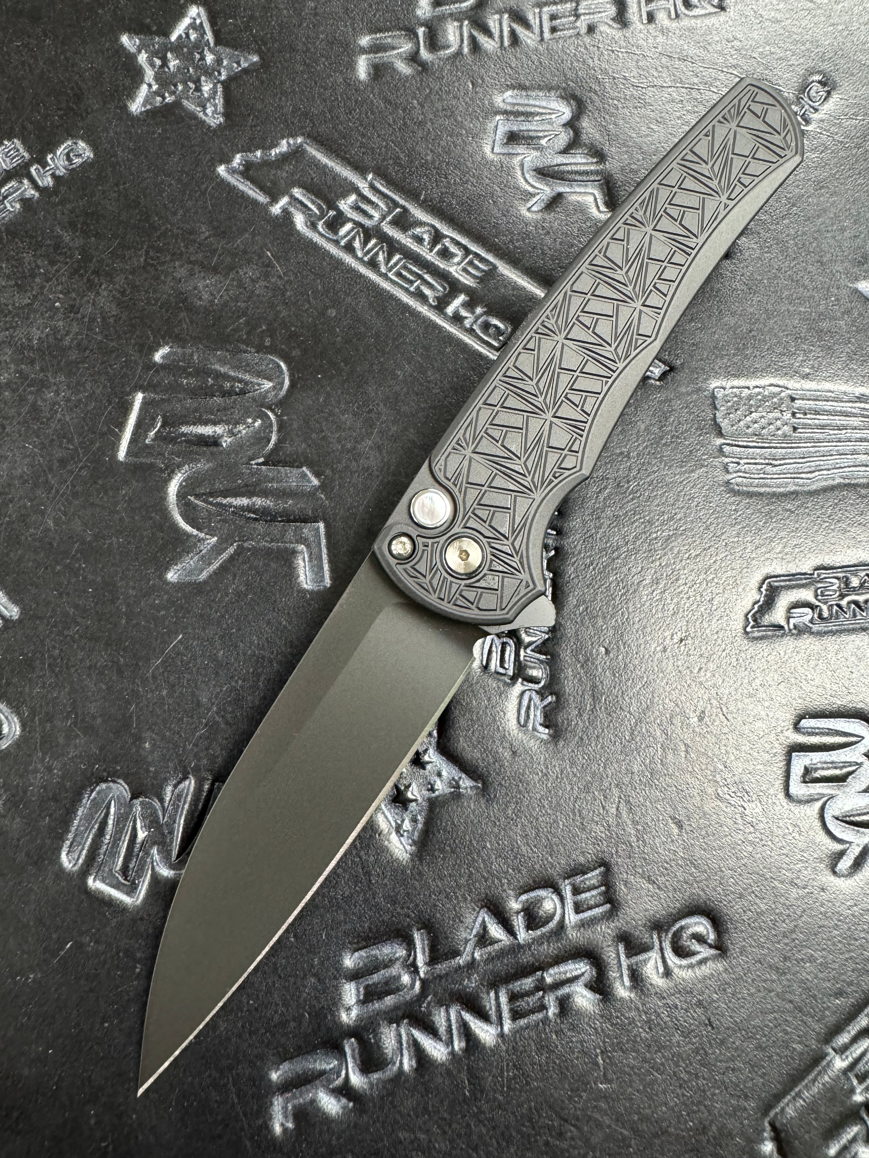 Protech Malibu Blade Show ATL 2024 Black Handle w Nexus ‘99 Texture MOP Button DLC Black Magnacut Wharncliffe /250