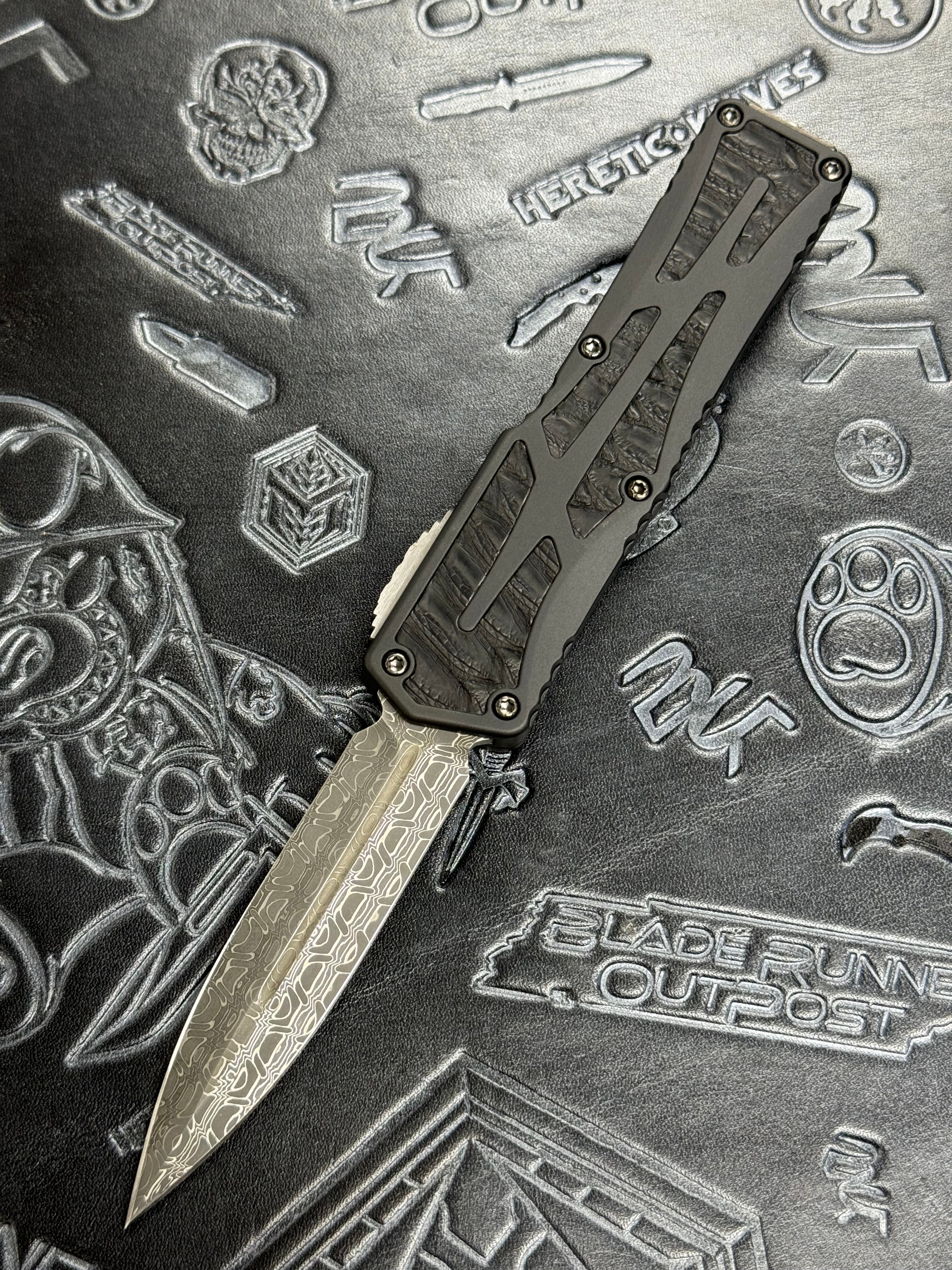 Pre Owned Heretic Knives Custom Colossus D/E Vegas Forged Reptilian Damascus, Anodized Aircraft Aluminum w/ Black Python Inlay