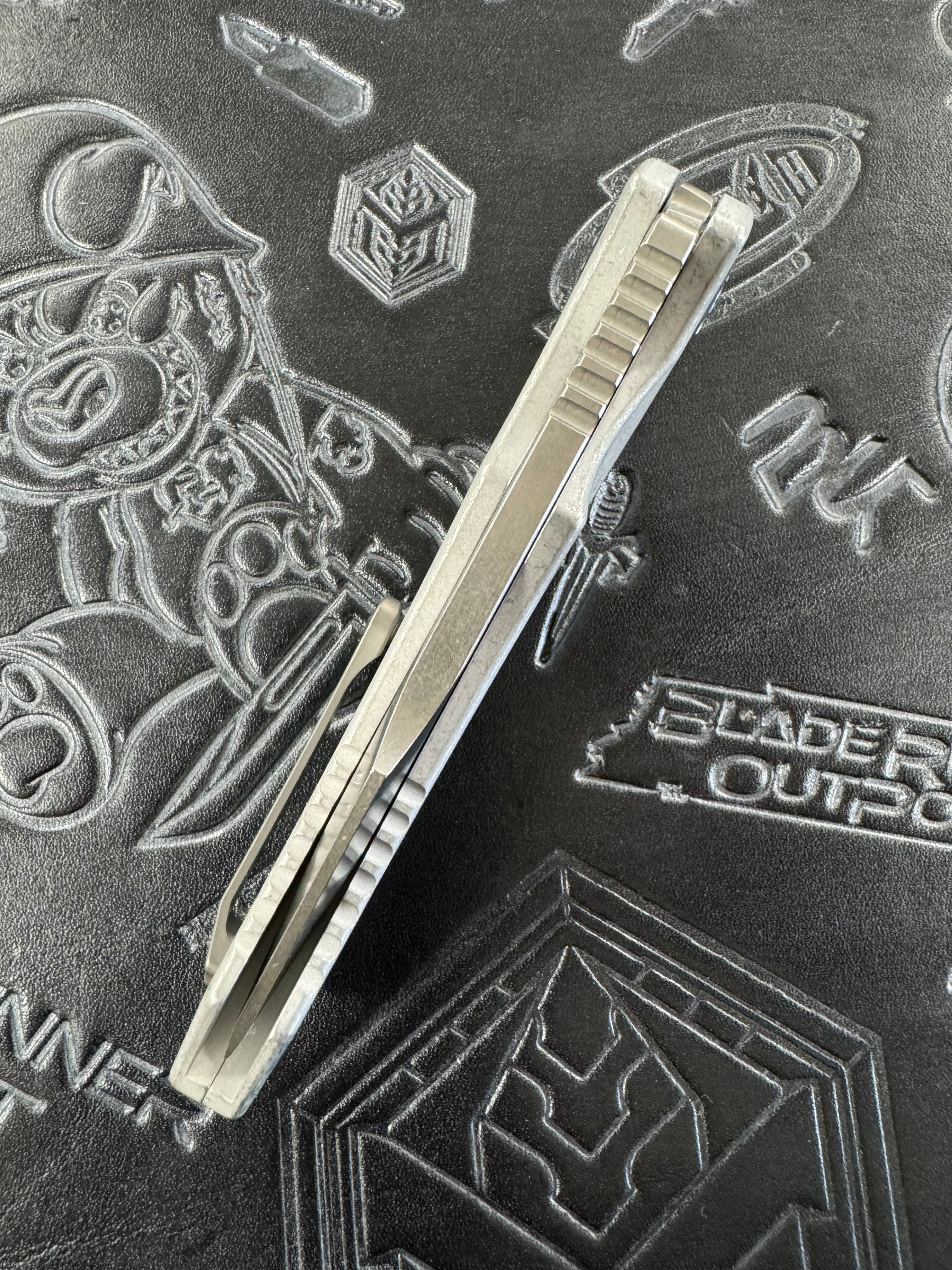 Heretic Knives Pariah Manual Button Lock Blizzard Worn Aluminum Handles w/ Stonewash MagnaCut H046-2A-BLZ