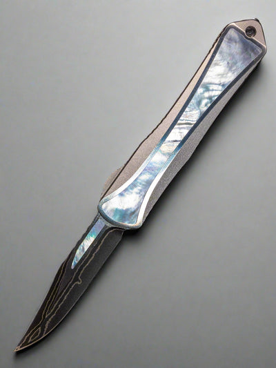 Heretic Manticore S Bowie Baker Forge Double Shim Stainless Steel Chassis Mother of Pearl Inlays Blue Ano Clip