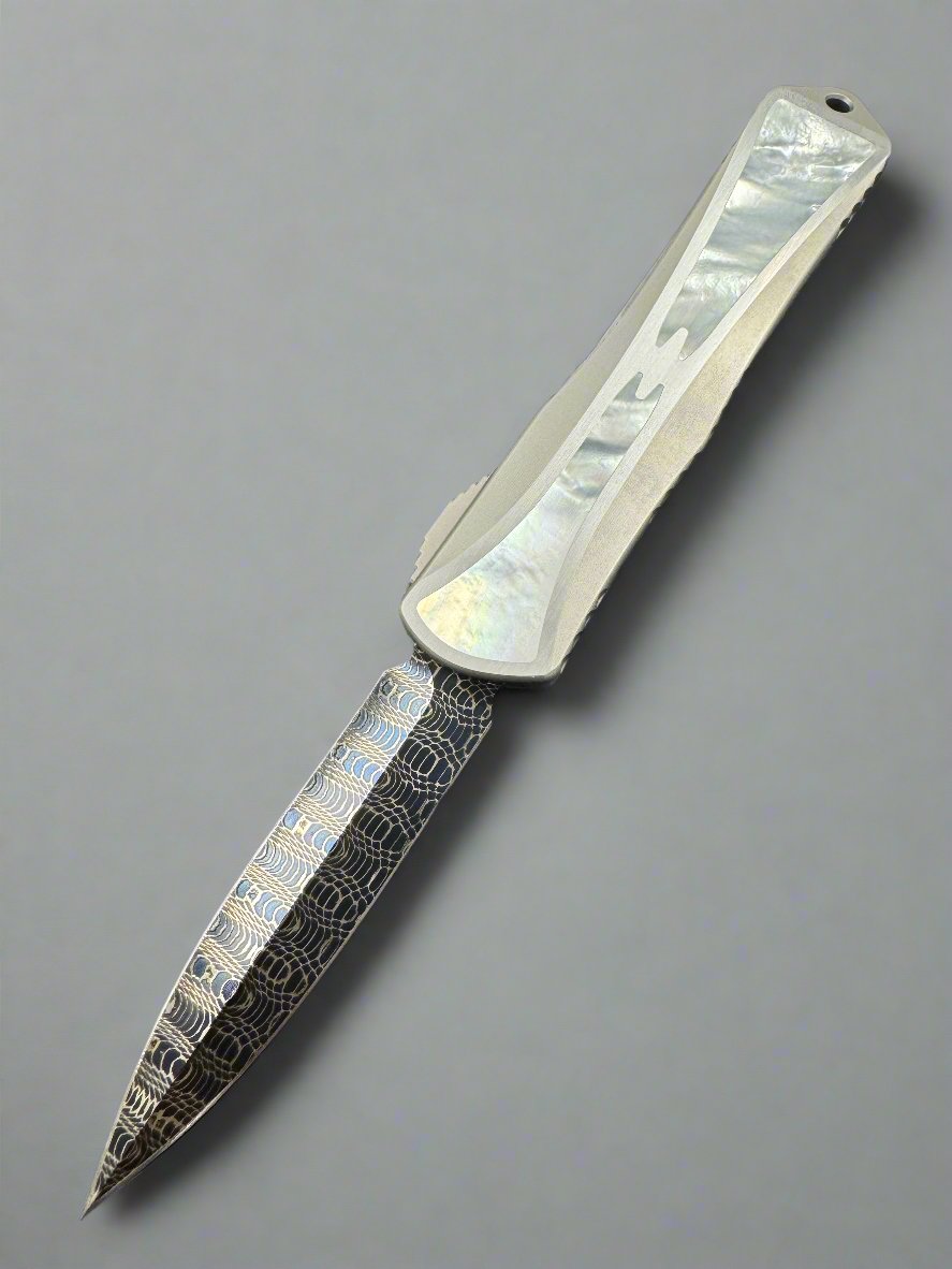 Pre Owned Heretic Knives Manticore X Hand Ground Vegas Forge Blued Damascus D/E & Hefted Stainless Steel Handle w/ Mother of Pearl Inlays