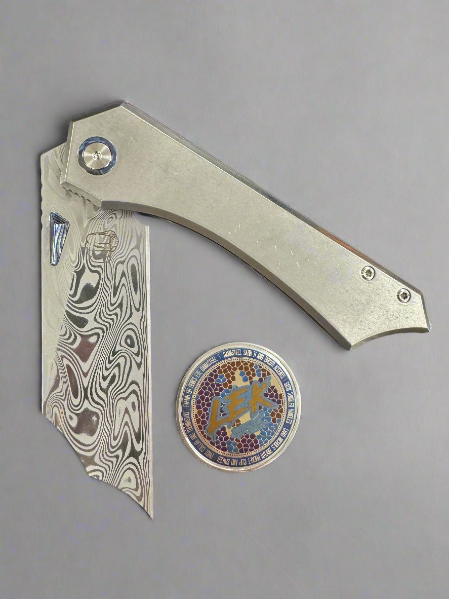 SOMETHING OBSCENE COMPANY LEK FOLDER KNIFE DAMASTEEL BLADE WITH TITANIUM HANDLES/ ZIRCU-TI ACCENTS