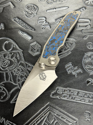 John Gray PHAT THUCK Satin Finish Magnacut Blade, Titanium Handles With Blue Camo Carbon Inlay