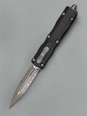 Microtech 227-11AP Dirac Delta D/E - Black Handle Partial Serrations - Apocalyptic Blade