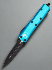 Microtech 232-1 TQ UTX-85 D/E - Turquoise Handle - Black Blade