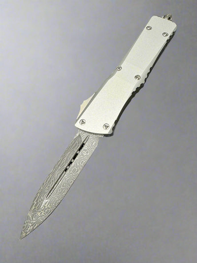 MICROTECH COMBAT TROODON OTF KNIFE- SIGNATURE SERIES- DOUBLE EDGE- CLEAR ANODIZED SMOOTH BODY HANDLE- DAMASCUS BLADE 142S-16 LPCRS