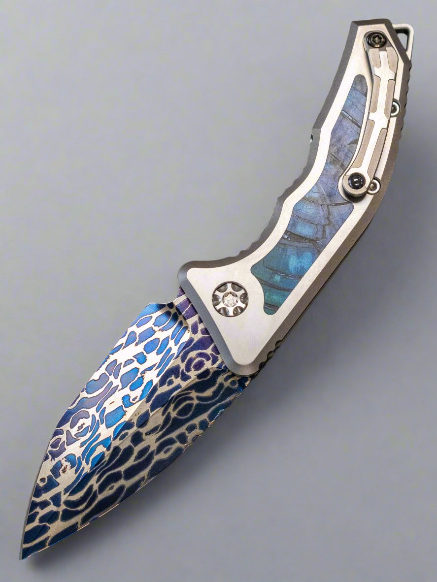Pre Owned Heretic Medusa (SN 005) Blue Vegas Forge Damascus Titanium w/ Mammoth Ivory Inlays Mammoth Ivory Inlaid Button