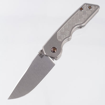 Attn2Detail Mercantile Mk.3 Medium Gen4 Drop Point Rising Grind - Bright Stonewash Titanium w/ Basketweave Faux Inlay Milling & Bronze Ano Hardware- Stonewash Satin Magnacut