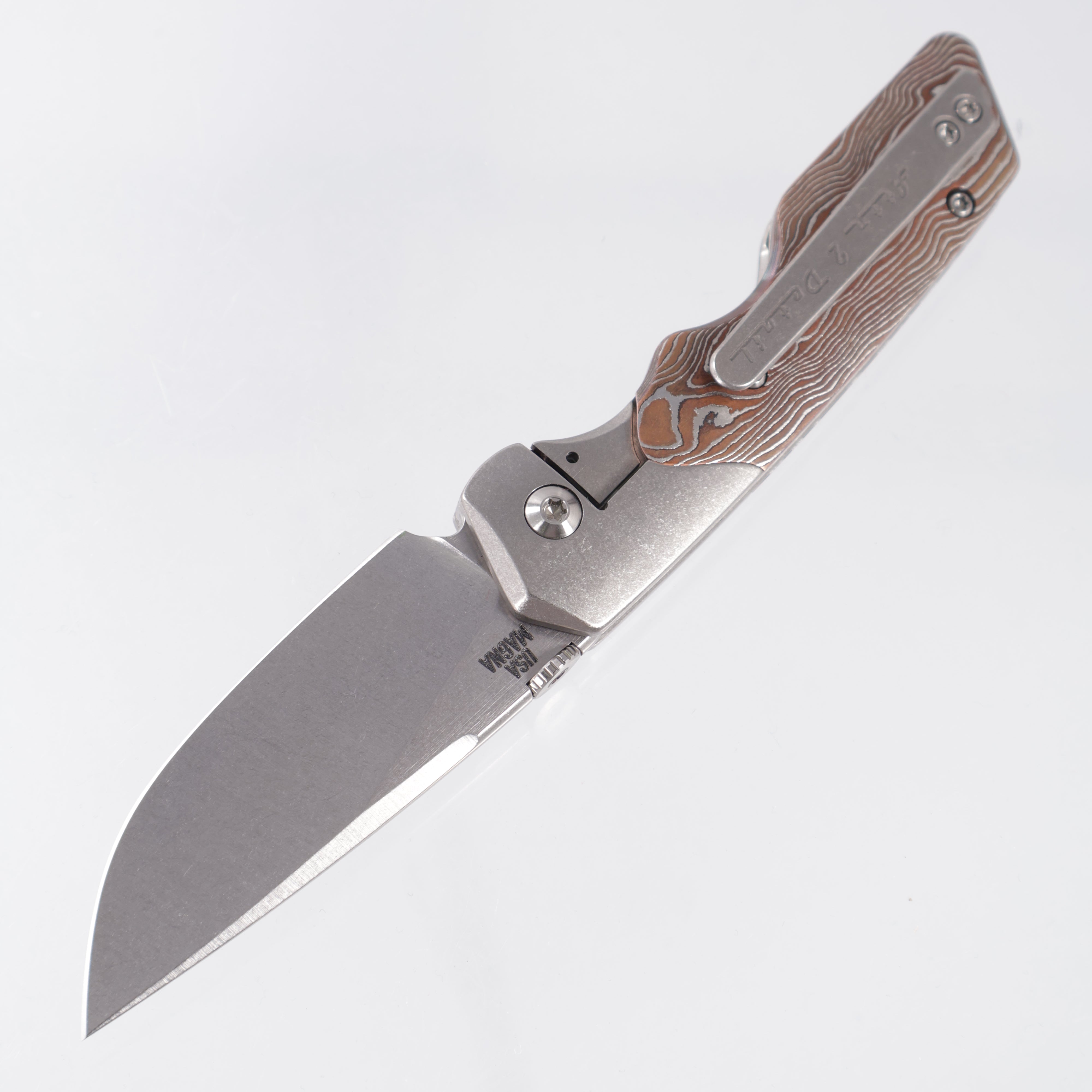 Attn2Detail Mercantile Mk.3 Medium Bolster Lock Gen4 Drop Point Rising Grind - Bright Stonewash Titanium w/ Zirc & Copper Damascus Scales - Stonewash Satin Magnacut