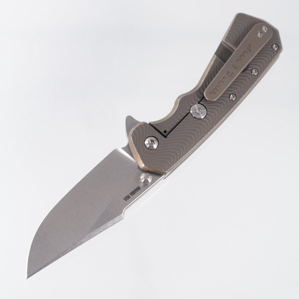 Attn2Detail Mercantile Delta Gen4 Harpoon Drop Point Rising Grind - Antique Bronze Ano Flow Milled Titanium - Stonewash Satin Magnacut - A2D