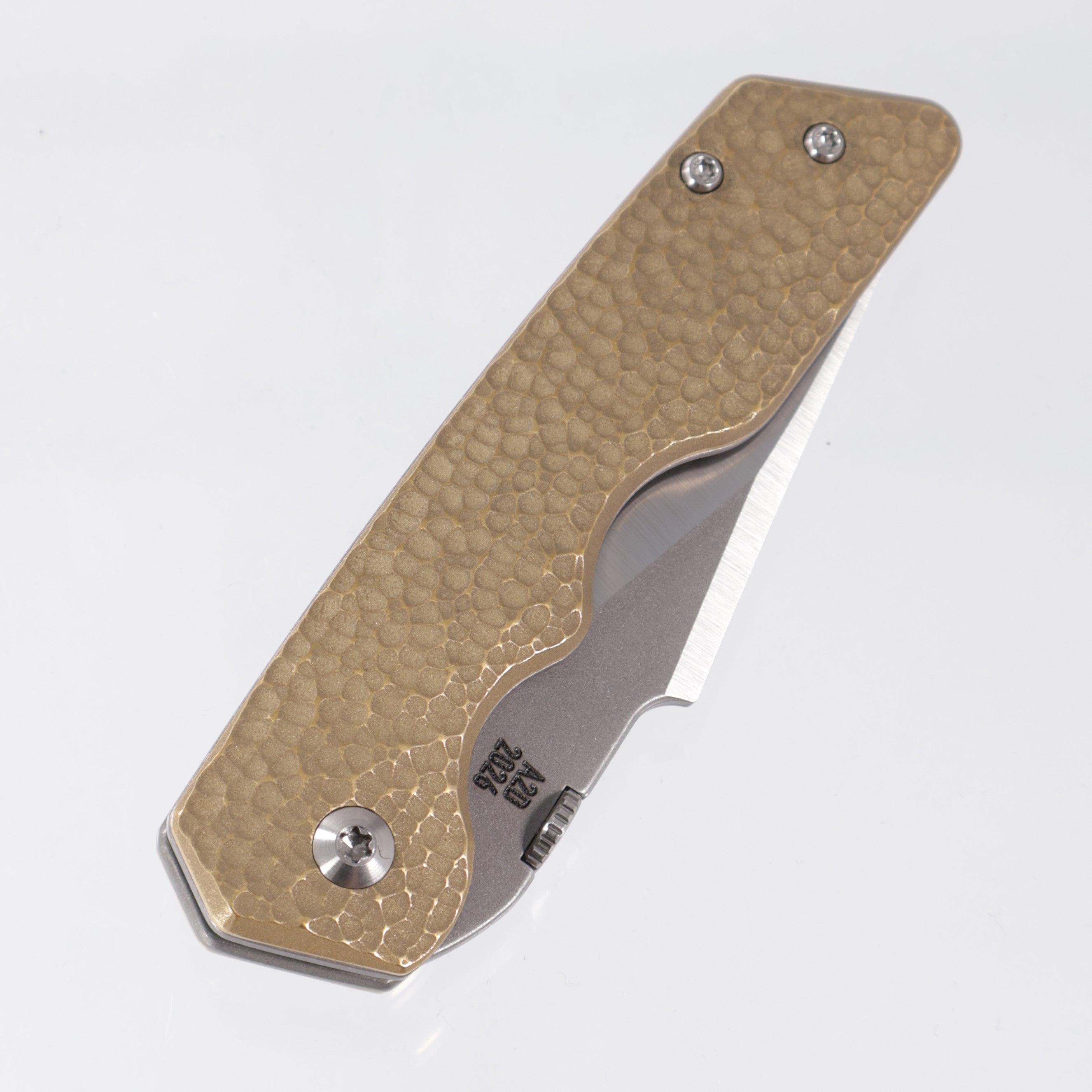 Attn2Detail Mercantile Mk.3 Medium Linerlock - Micro-Hammered Brass Scales w/ Greywash Ti Liners - Harpoon Rising Grind Magnacut