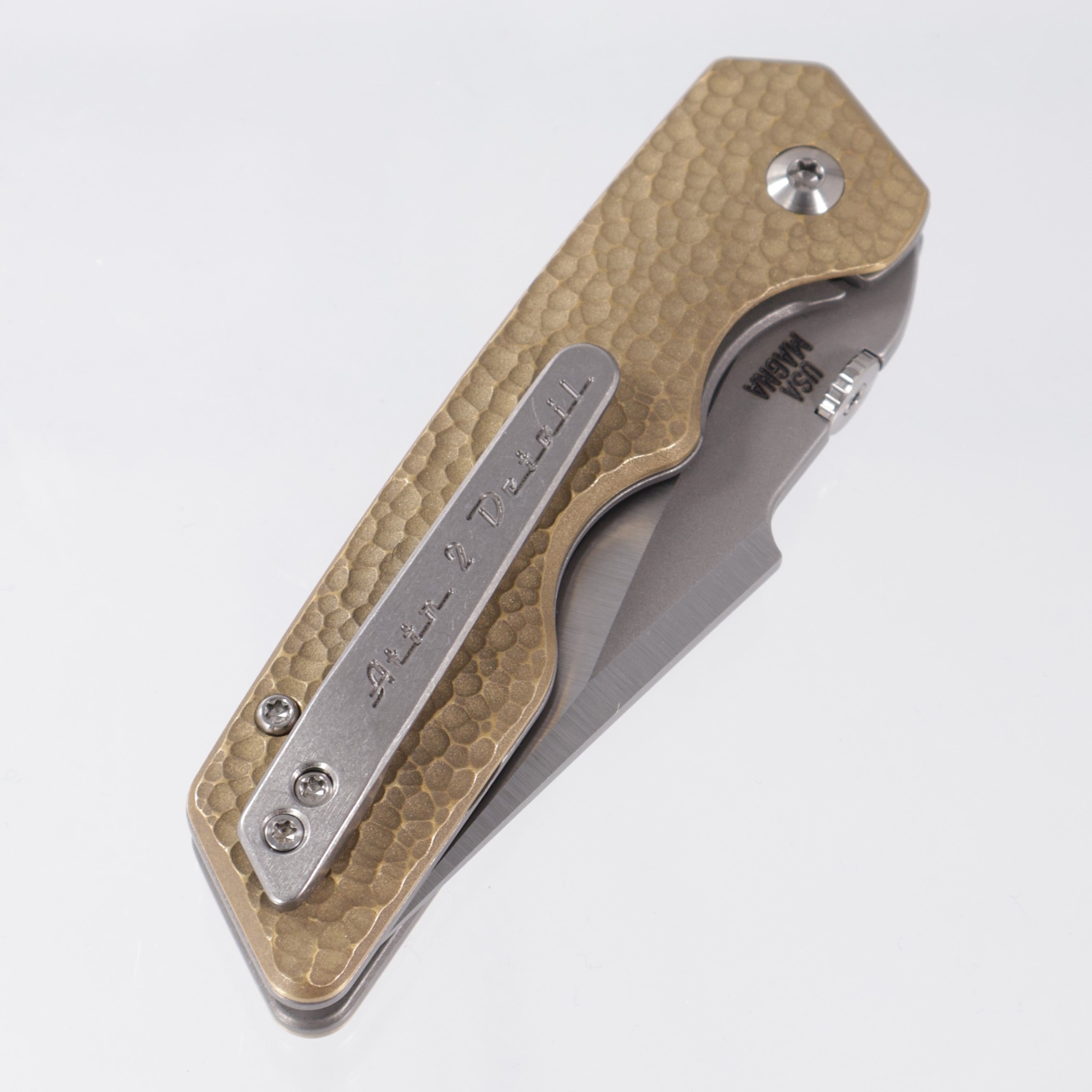 Attn2Detail Mercantile Mk.3 Medium Linerlock - Micro-Hammered Brass Scales w/ Greywash Ti Liners - Harpoon Rising Grind Magnacut