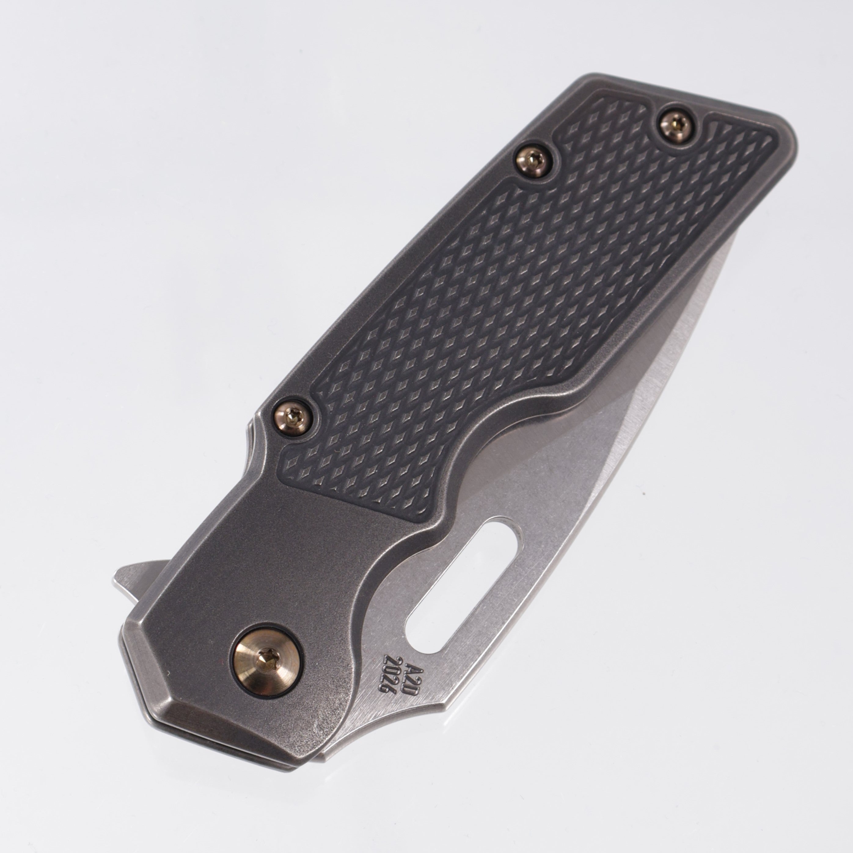 Attn2Detail Mercantile Mk.1 Large Gen4 Drop Point Rising Grind - Blackwash Contoured M16 Grip Titanium w/ Bronze Hardware - Stonewash Satin Magnacut