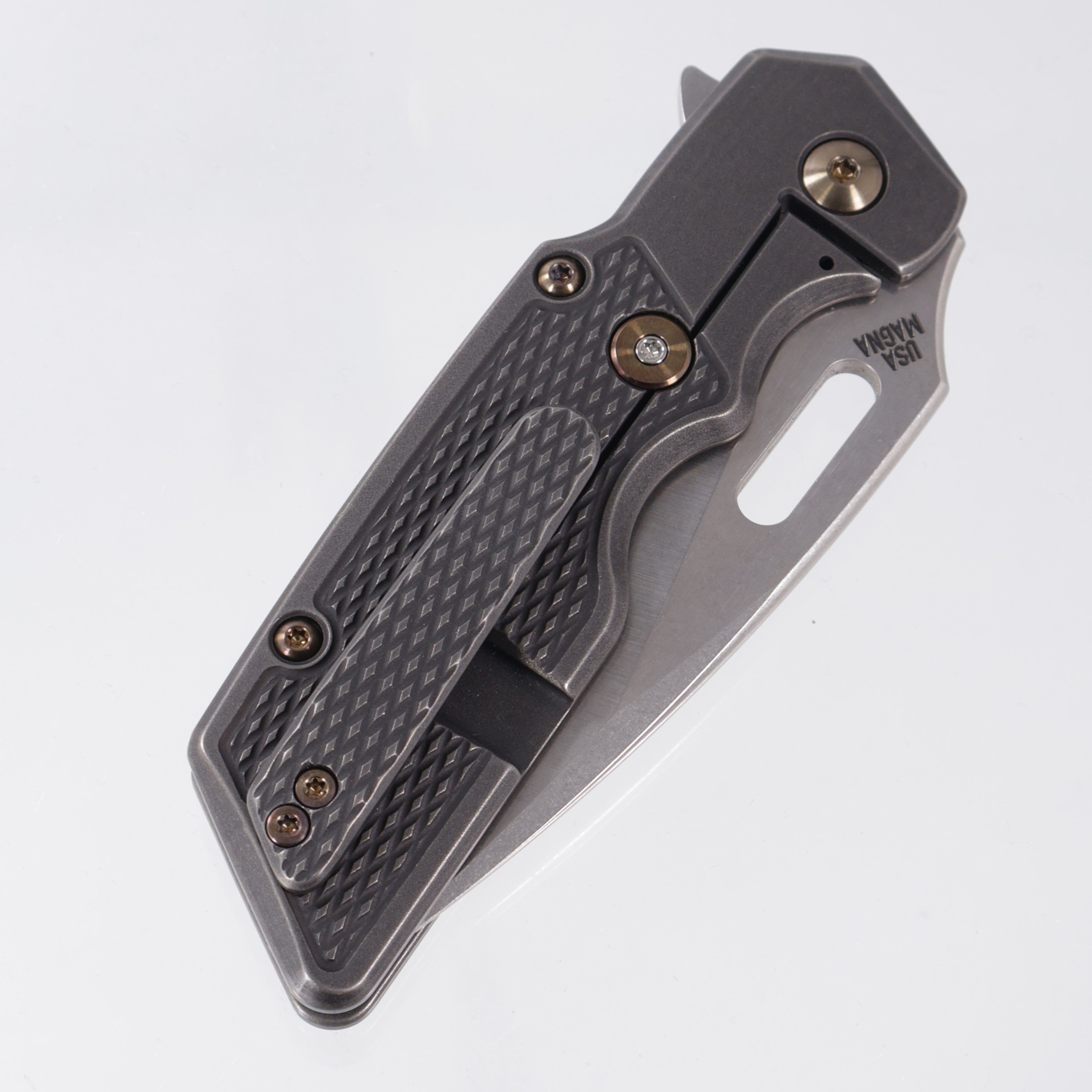 Attn2Detail Mercantile Mk.1 Large Gen4 Drop Point Rising Grind - Blackwash Contoured M16 Grip Titanium w/ Bronze Hardware - Stonewash Satin Magnacut