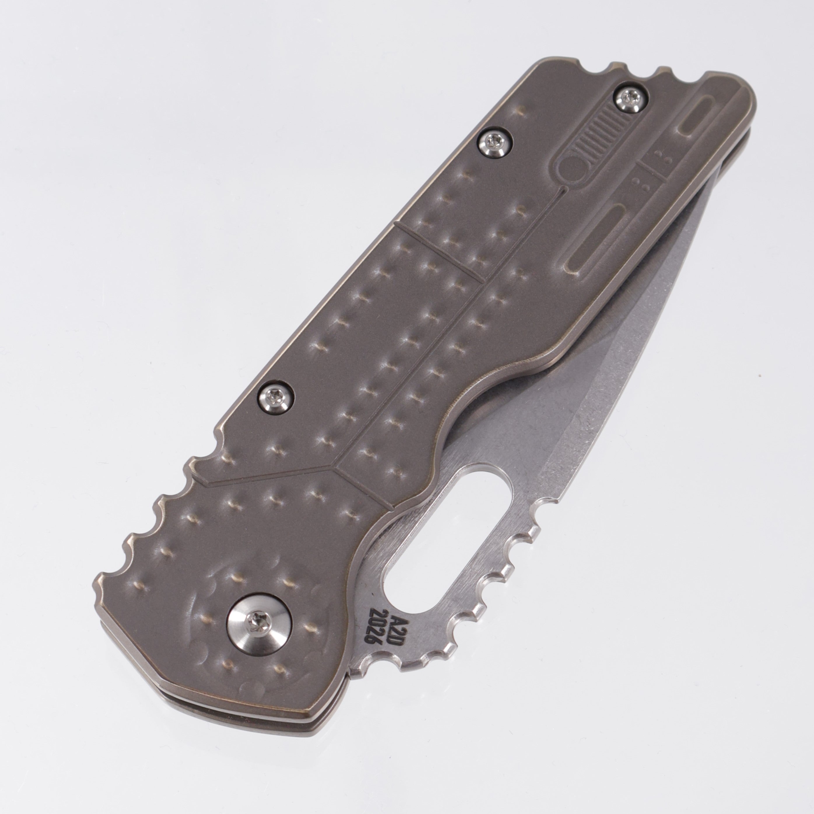 Attn2Detail Mercantile Mk.2 Large Gen4 Drop Point Rising Grind - Antique Bronze Ano Tank Machining Titanium - Stonewash Satin Magnacut