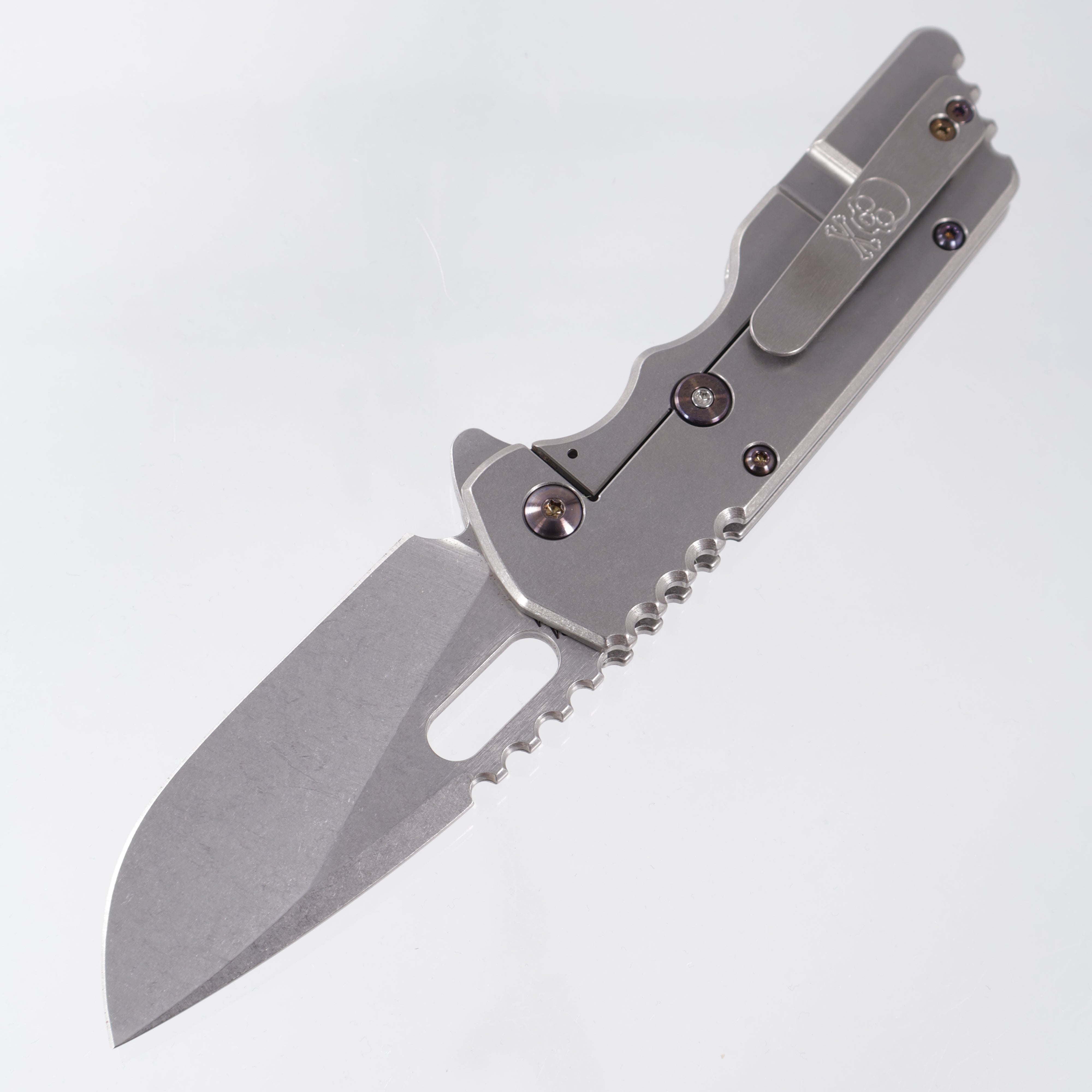Attn2Detail Mercantile Mk.2 Large Gen4 Drop Point Rising Grind - Stonewash Titanium w/ Marbled Carbon Fiber Skull & Crossbones Inlay & Flamed Hardware - Stonewash Satin Magnacut