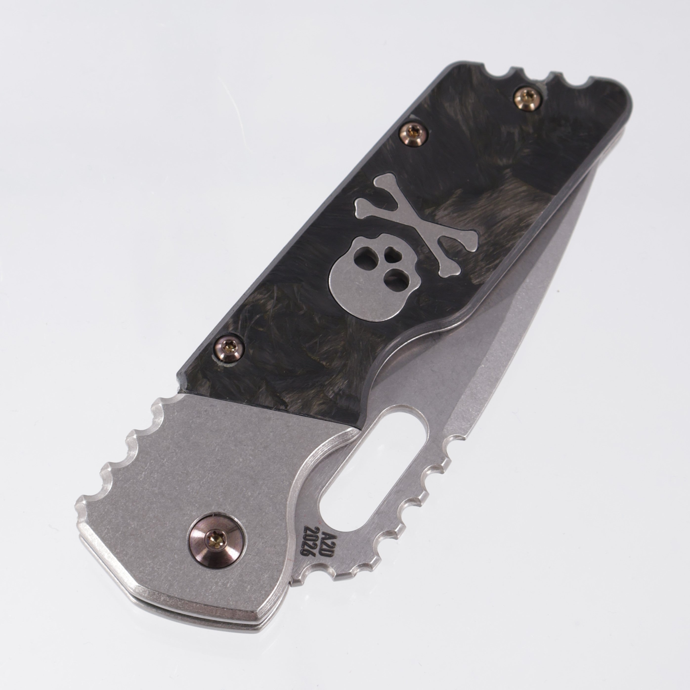 Attn2Detail Mercantile Mk.2 Large Gen4 Drop Point Rising Grind - Stonewash Titanium w/ Marbled Carbon Fiber Skull & Crossbones Inlay & Flamed Hardware - Stonewash Satin Magnacut