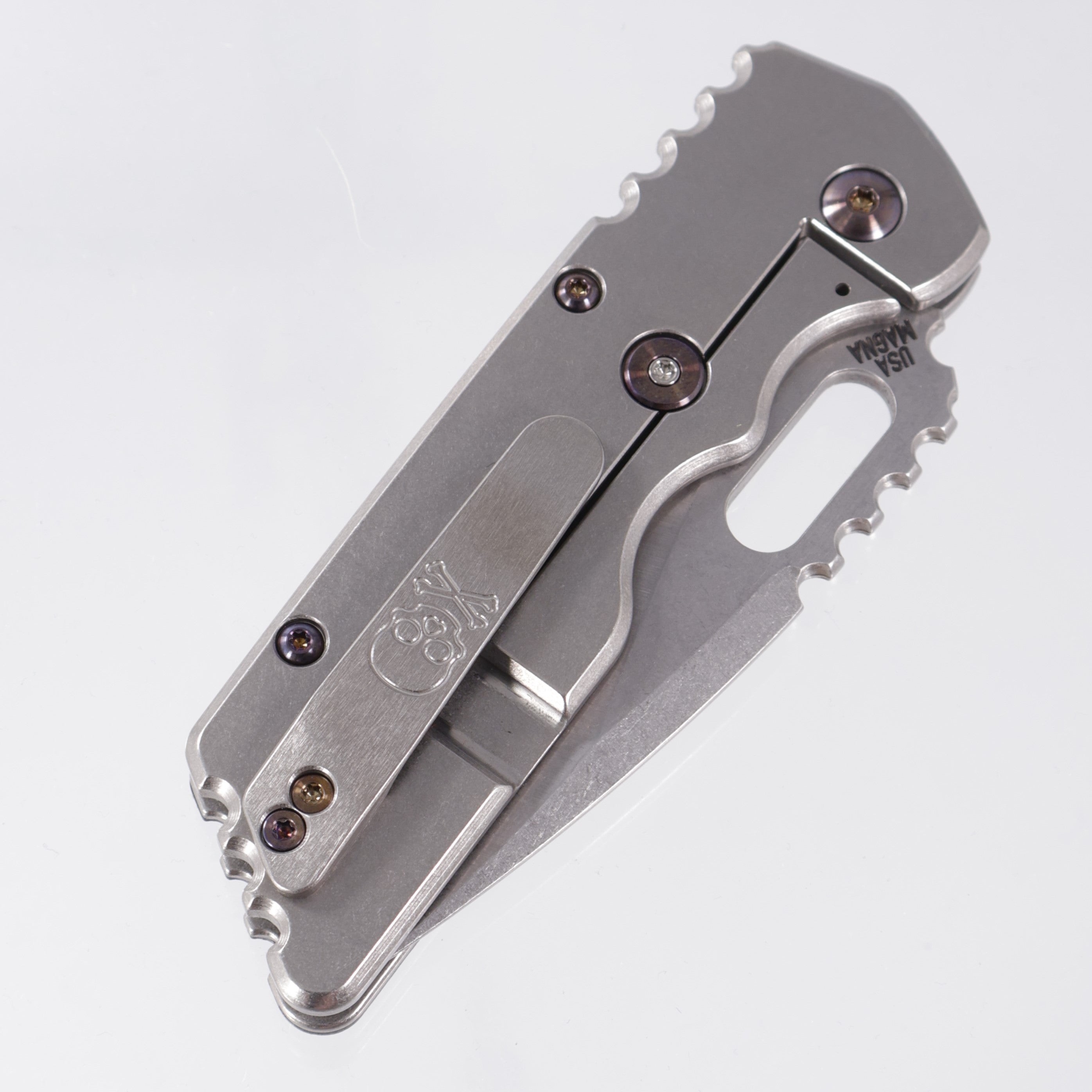 Attn2Detail Mercantile Mk.2 Large Gen4 Drop Point Rising Grind - Stonewash Titanium w/ Marbled Carbon Fiber Skull & Crossbones Inlay & Flamed Hardware - Stonewash Satin Magnacut
