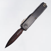 Microtech Marfione Select UTX-85 Gen III Double Edge - Hefted Black Aluminum Chassis w/ Purple Ti Accents & Bronzed Hardware - Blued Baker Forge Damascus - 1232-16MS3 *PRE-OWNED*