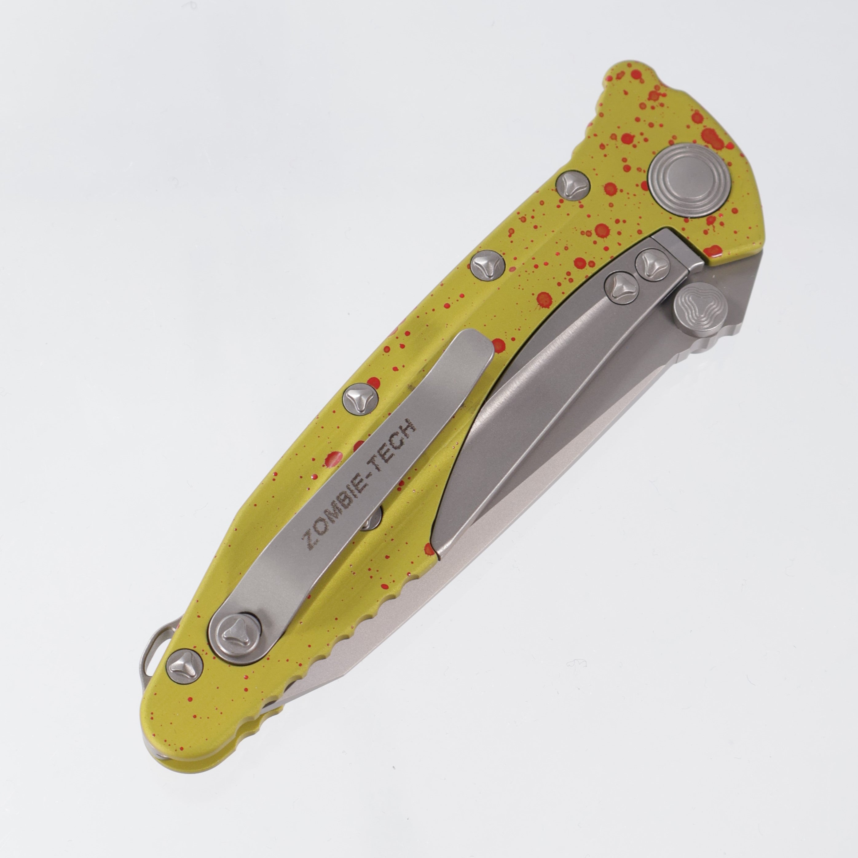 Microtech Socom Delta Manual Zombie-Tech Tanto - Zombie Splatter Yellow/Red Aluminum - Beadblast Full Serrate - A163-9Z *PRE-OWNED*