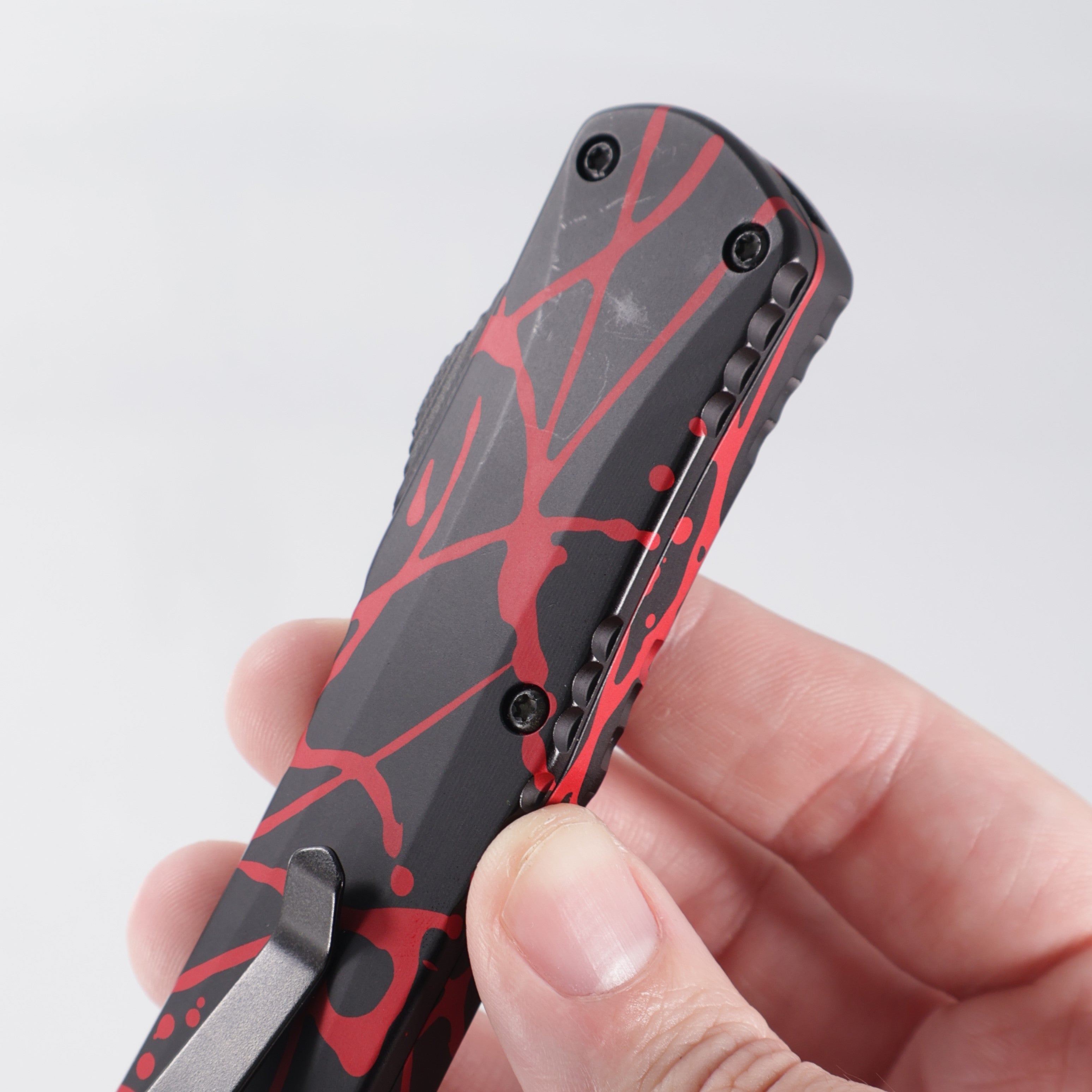 Heretic Manticore X Double Edge - Black w/ Red Splash Pattern Aluminum - DLC S35VN - H032-6A-RS *PRE-OWNED*