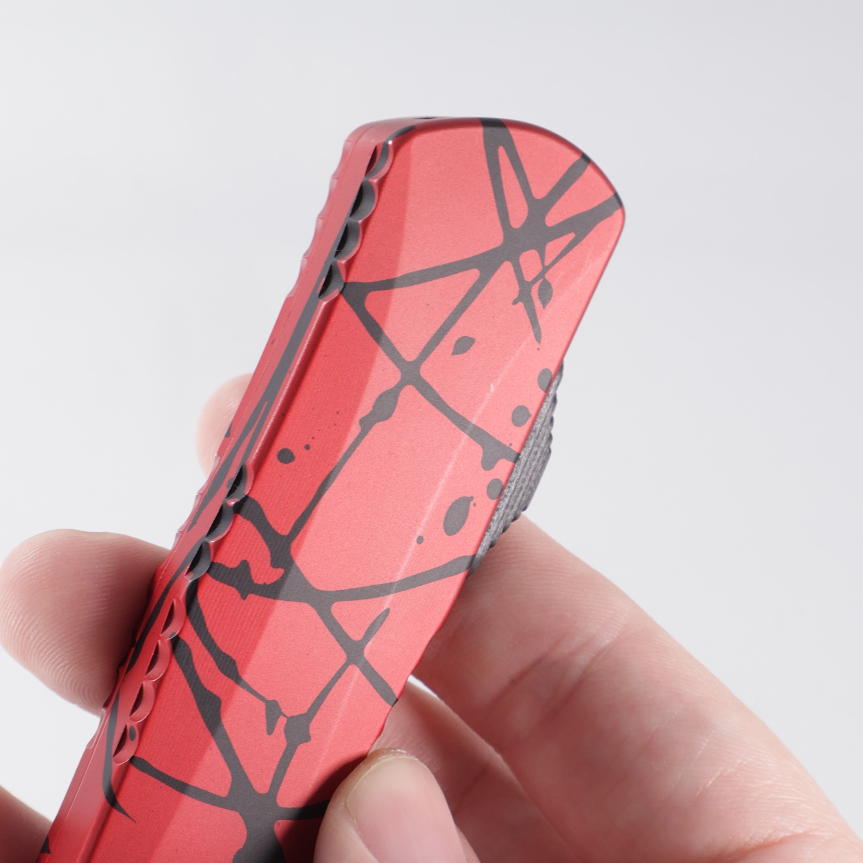 Heretic Manticore X Double Edge - Red w/ Black Splash Pattern Aluminum - DLC S35VN - H032-6A-REDBS *PRE-OWNED*