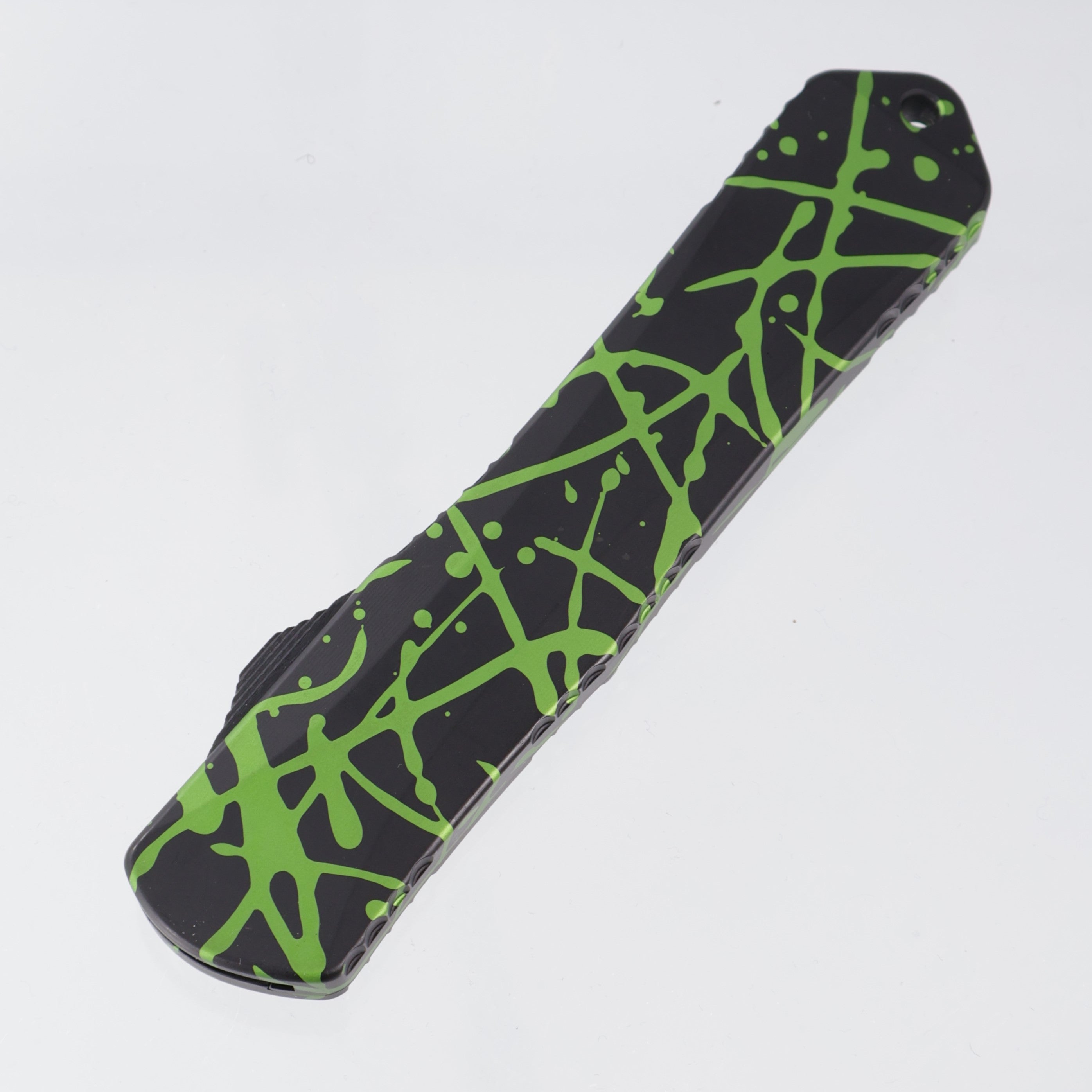 Heretic Manticore X Double Edge - Black w/ Green Splash Pattern