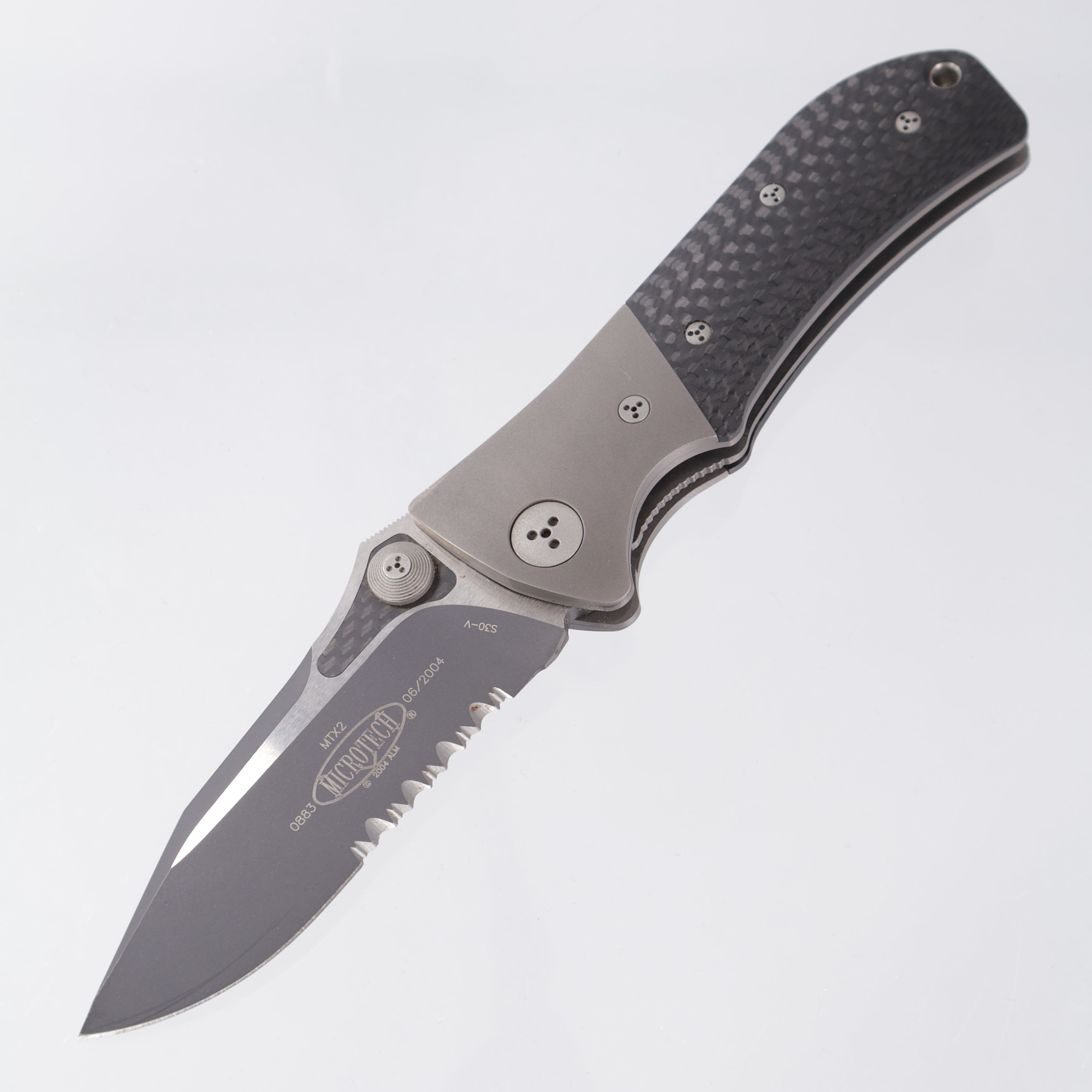 Microtech MTX-2 D/A - Carbon Fiber w/ Titanium Bolsters - 2-Tone Black Partial Serrate S30V - 06/2004 Build *PRE-OWNED*