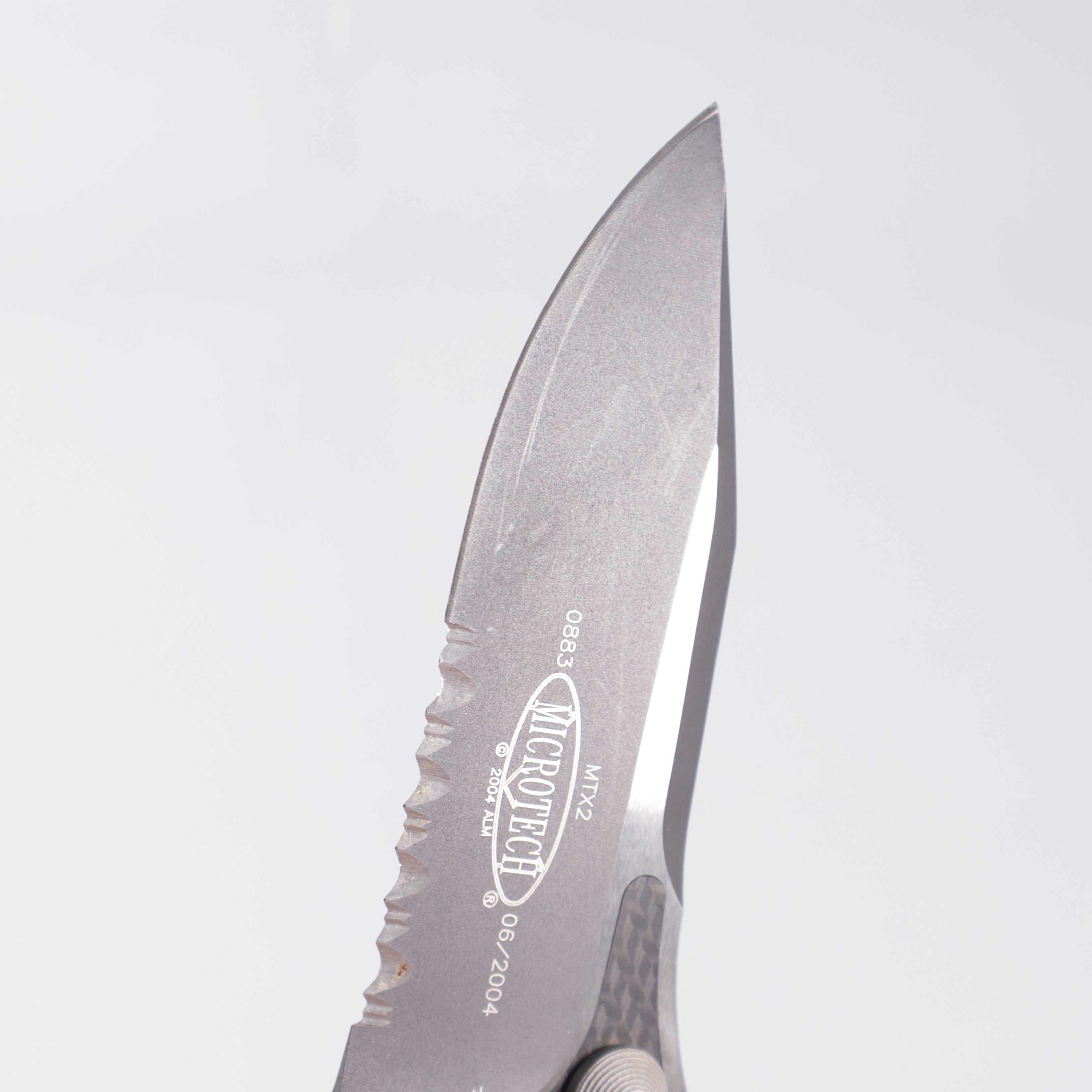 Microtech MTX-2 D/A - Carbon Fiber w/ Titanium Bolsters - 2-Tone Black Partial Serrate S30V - 06/2004 Build *PRE-OWNED*