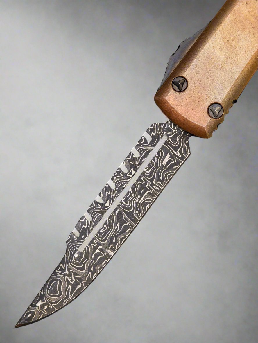 Pre Owned (Trade In) Reese Weiland Damascus Blade in Microtech Ultratech  223-1DLCTCPS Chassis Signature Series Copper Top Handle